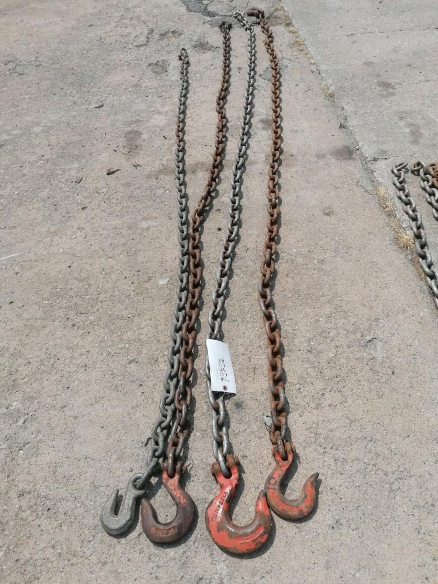 (3) 1/2" USA 9' & (1) 1/2" USA 8' Chain with Hook. Located at 301 E Henry Street, Mt. Pleasant, IA