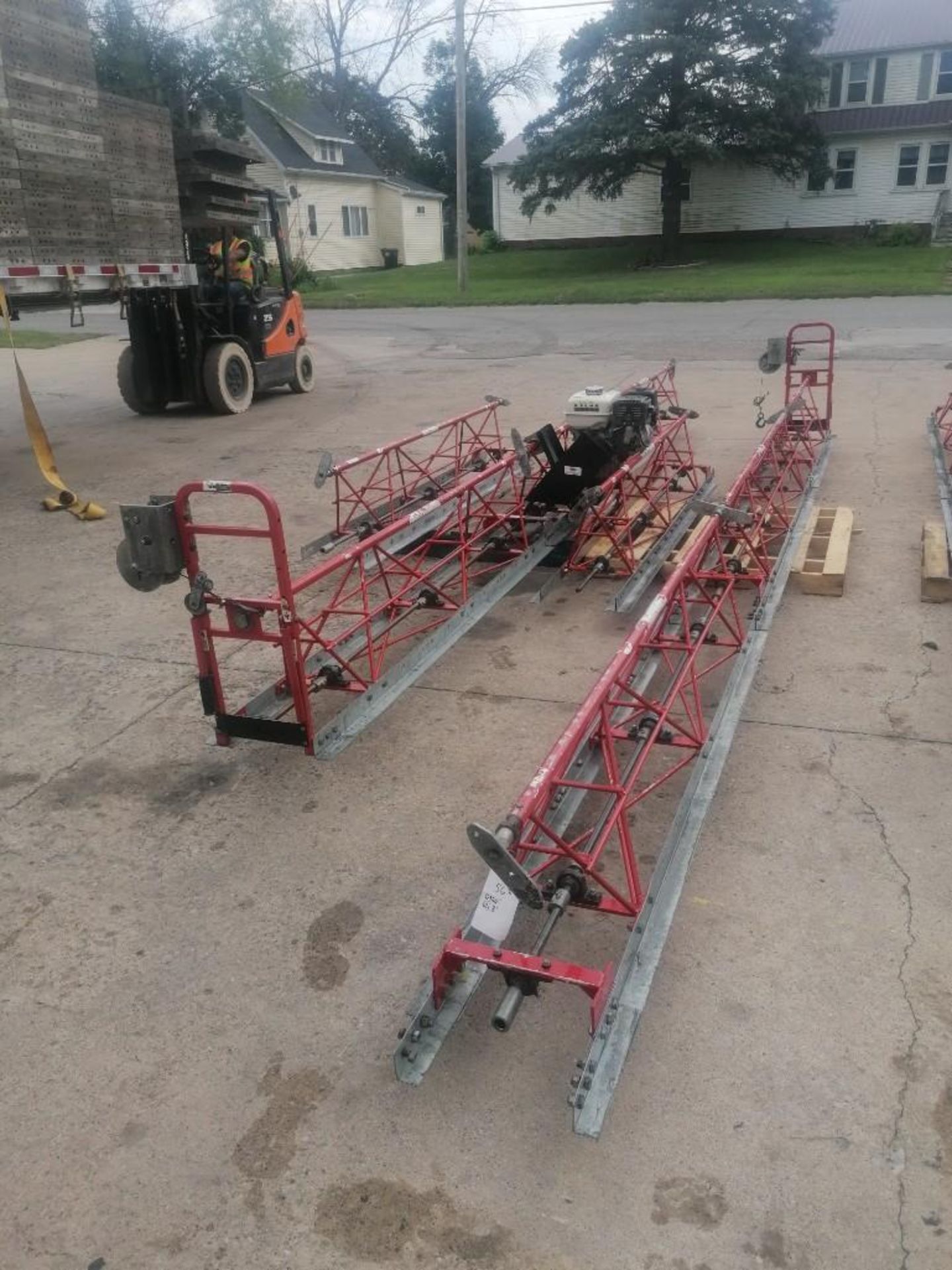 56' Allen Razorback Hydraulic Truss Screed with Honda GX270 Engine. Located at 301 E Henry Street,