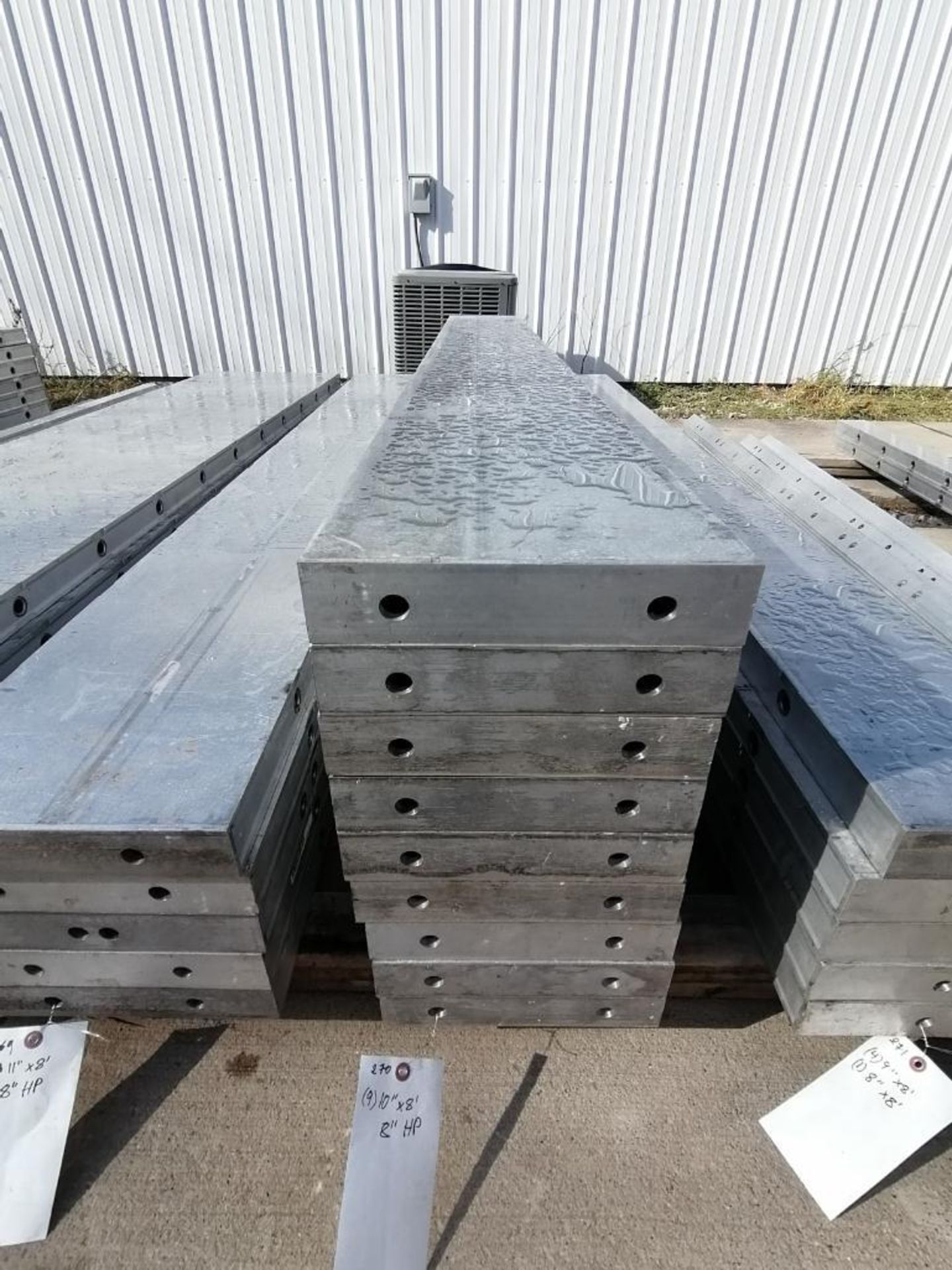 (9) 10" x 8' NEW Badger Smooth Aluminum Concrete Forms 8" Hole Pattern. Located in Mt. Pleasant,