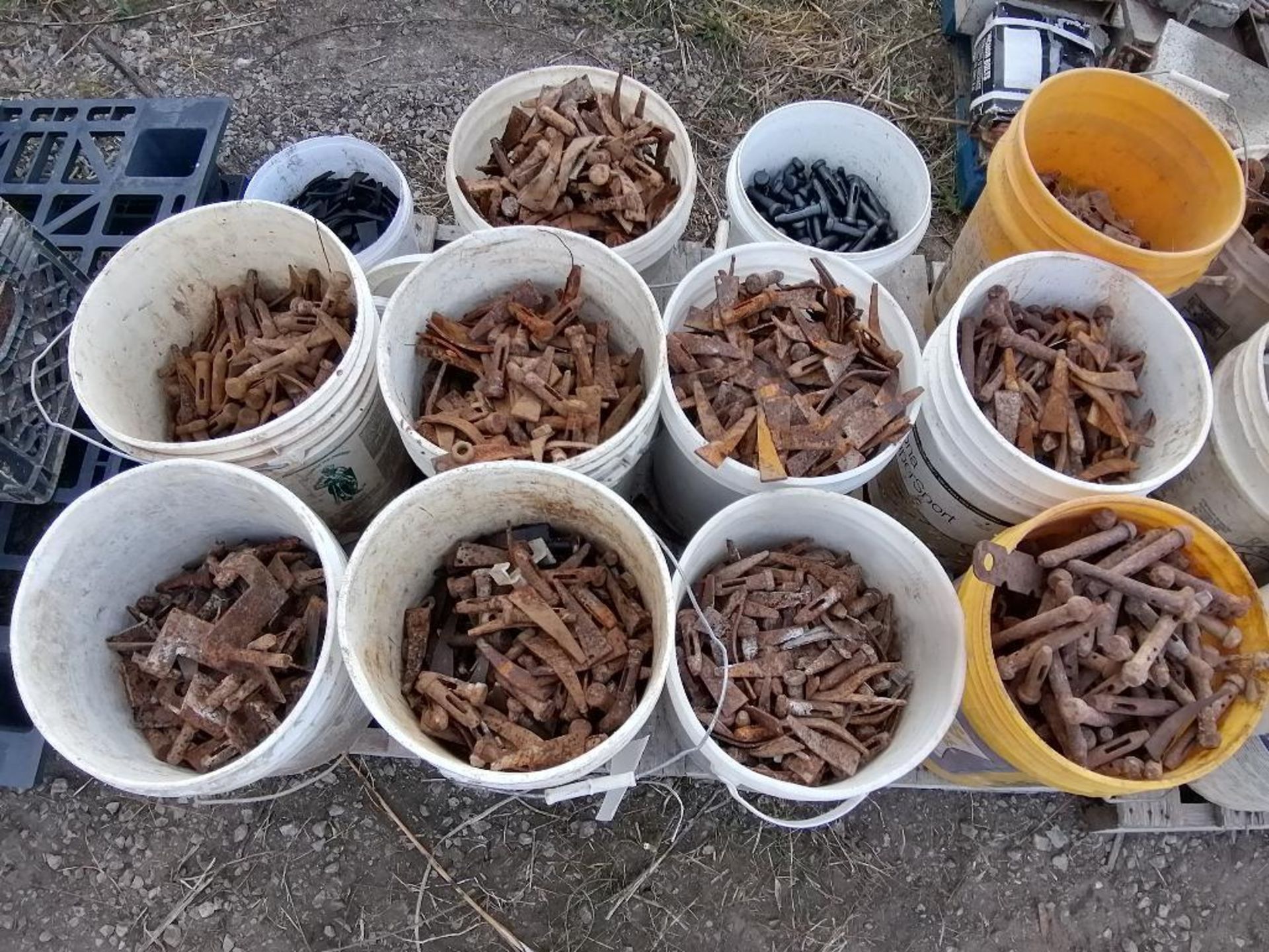 (12) Buckets of Pins & Wedges. Located in Ixonia, WI