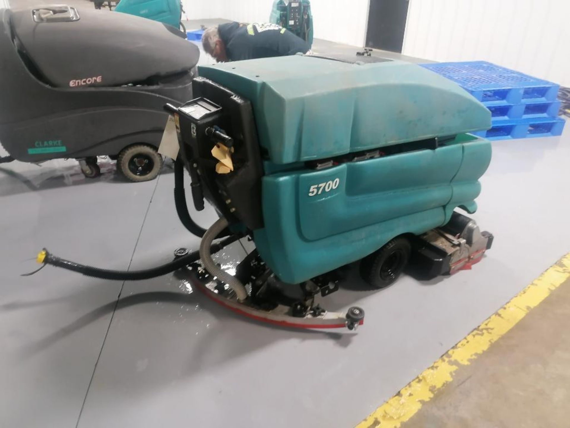 Tennant 5700 Floor Scrubber, Serial #15394, 36 V. Located in Mt. Pleasant, IA.