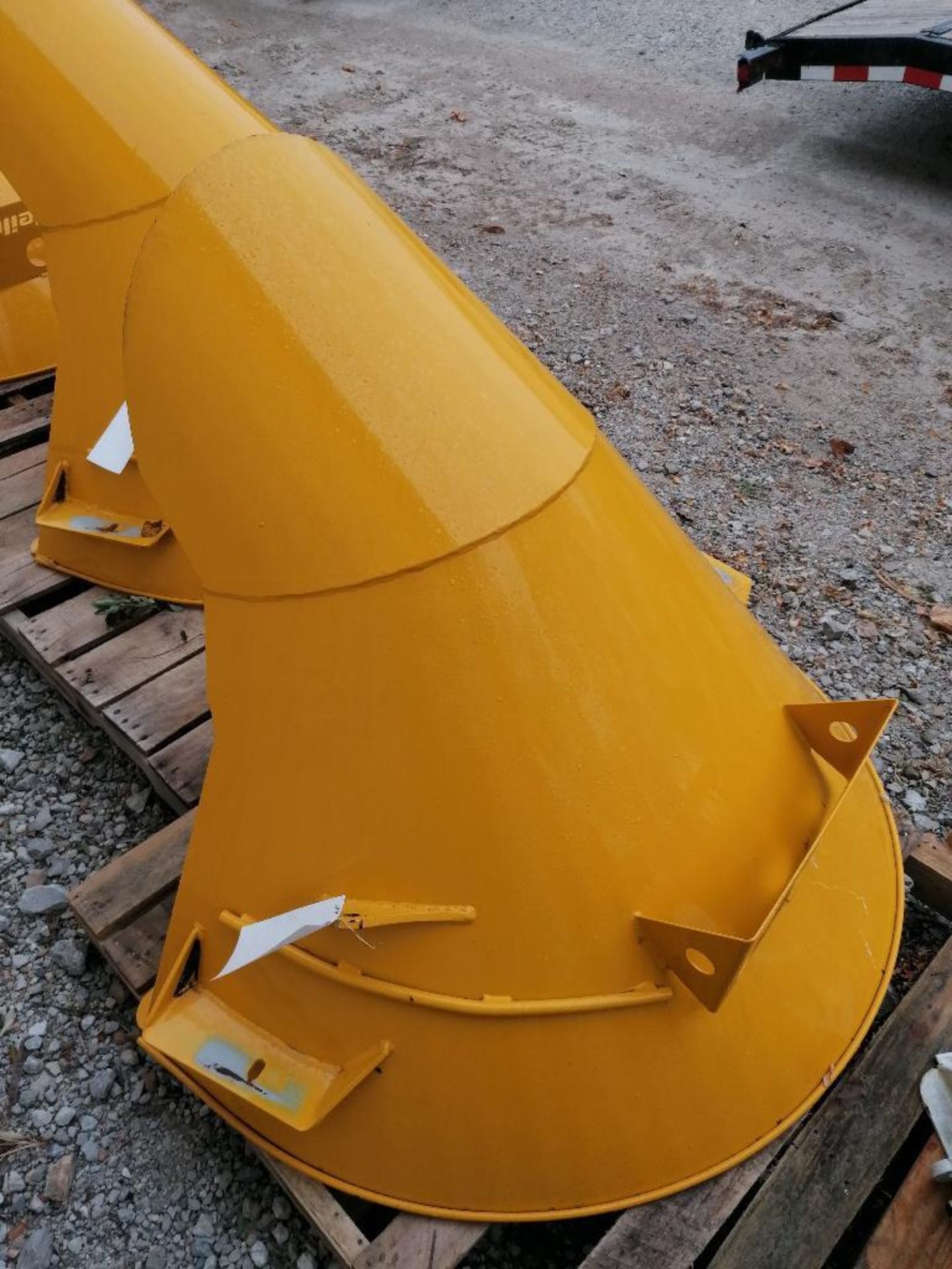 (1) Yellow McNeilus MTM Mixer Charge Hopper. Located in Mt. Pleasant, IA.