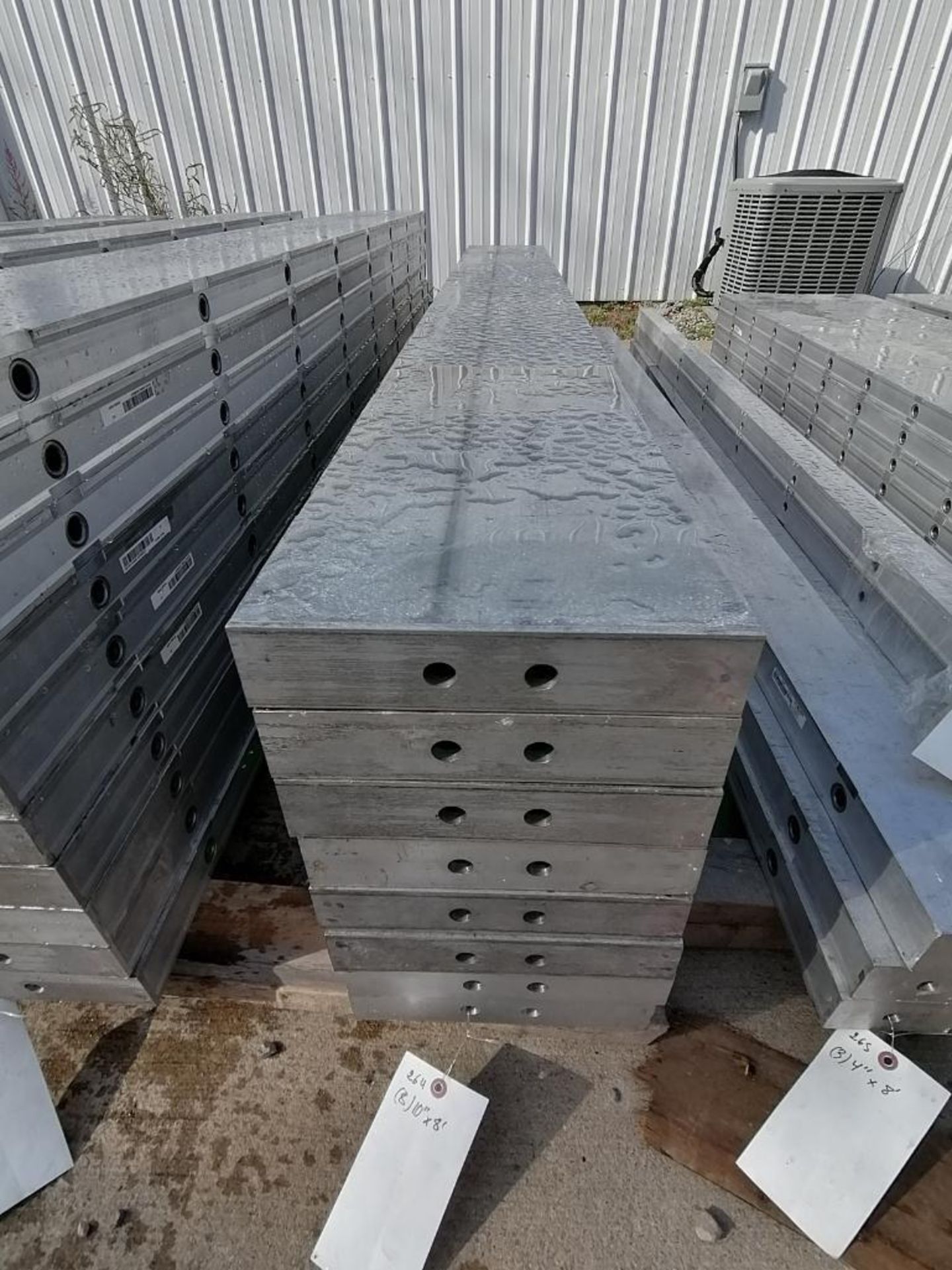 (8) 10" x 8' NEW Badger Smooth Aluminum Concrete Forms 6-12 Hole Pattern. Located in Mt. Pleasant,