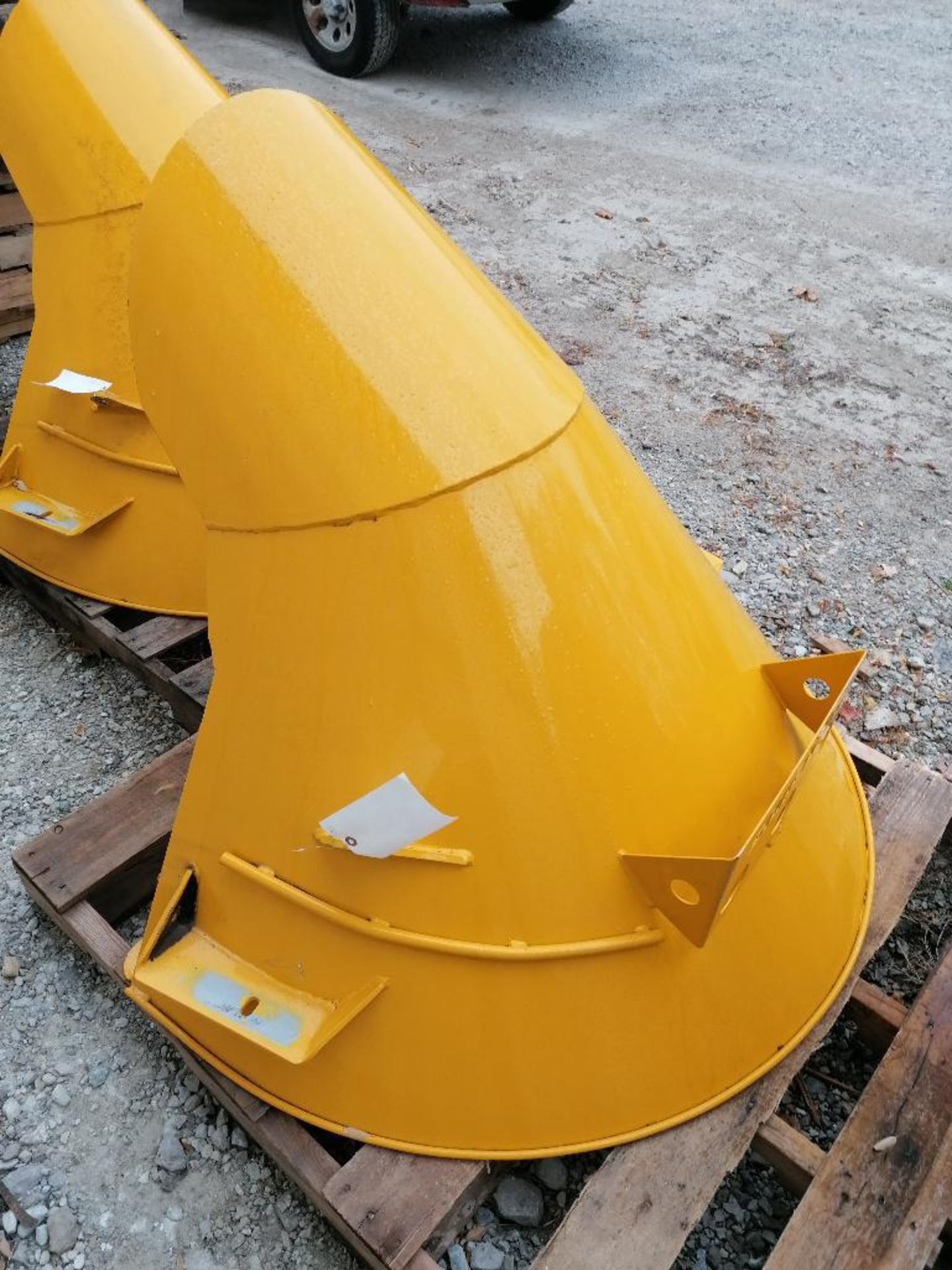 (1) Yellow McNeilus MTM Mixer Charge Hopper. Located in Mt. Pleasant, IA.