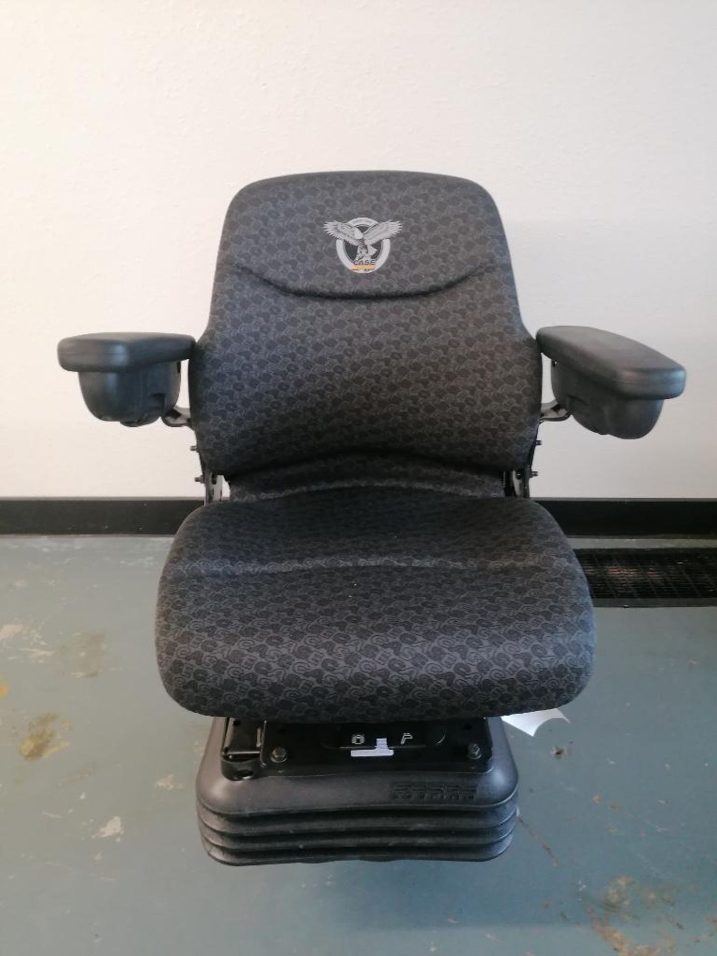 CNH Air Suspension Seat for Case Backhoe, Serial #007091742359. Located in Mt. Pleasant, IA.
