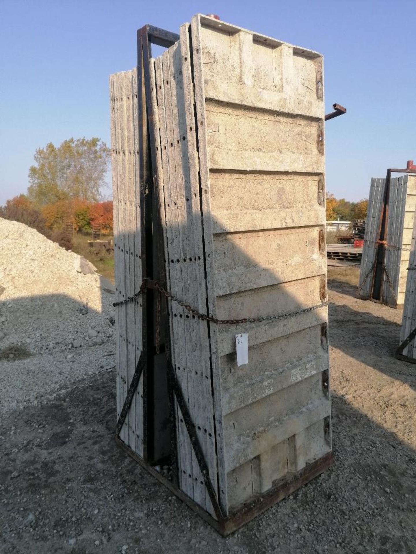 (16) 36" x 8' Smooth Aluminum Concrete Forms 6-12 Hole Pattern, Bell Basket included. Located in