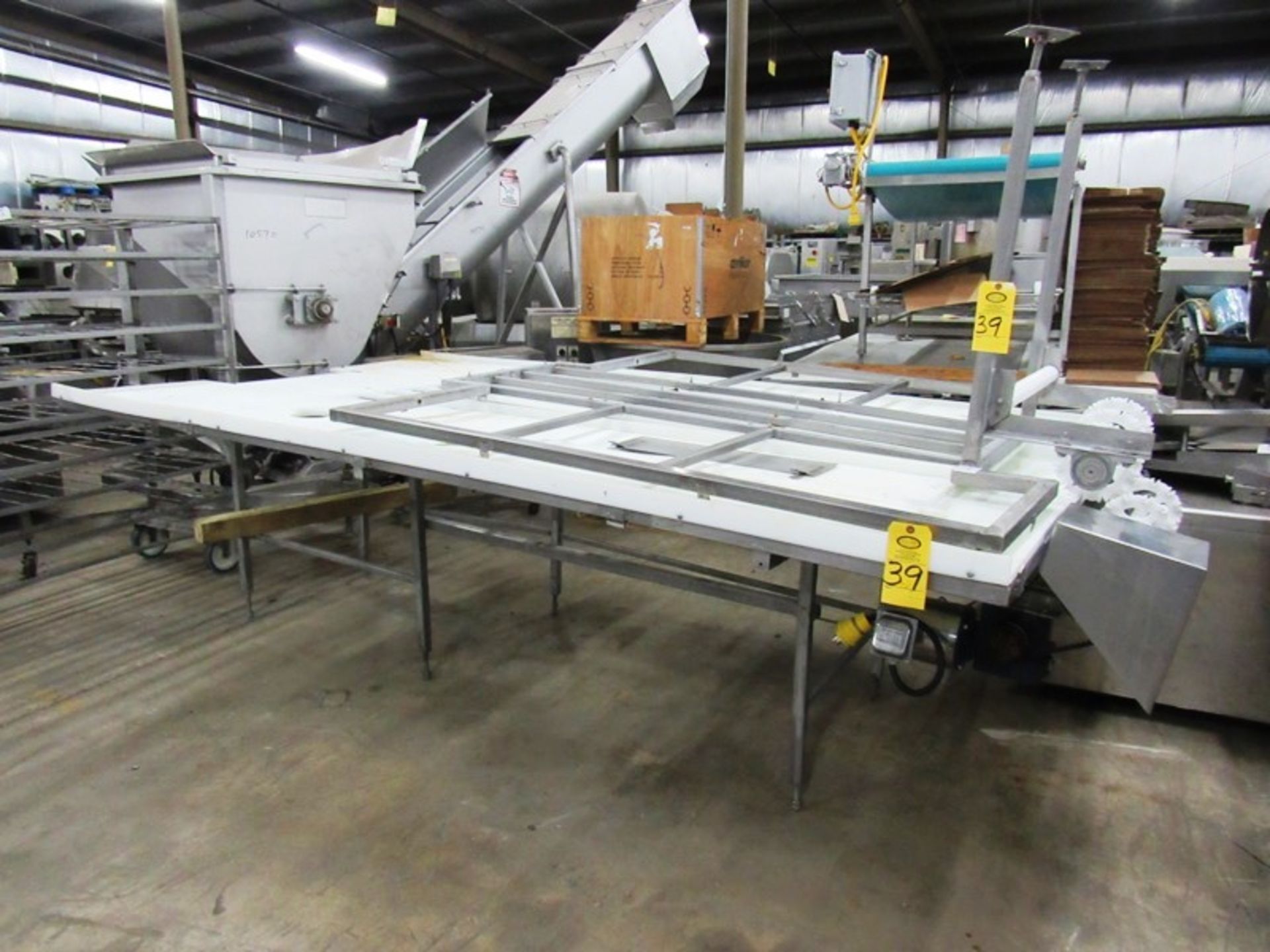 Stainless Steel Trim Conveyor, 75" W X 18' L X 40" T, 24" wide center belt, 24" W poly work stations