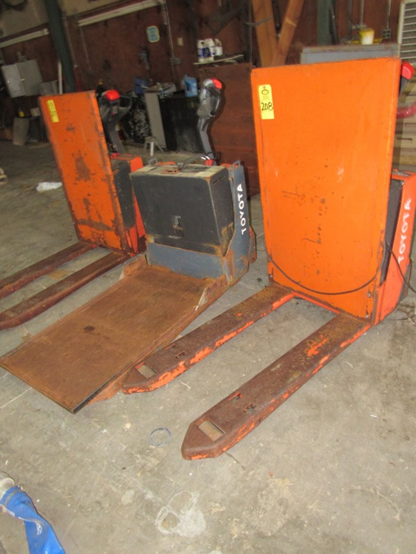 Lot of (2) Toyota Electric Pallet Jacks, 24 volt, on board chargers (Required Loading Fee $200.00