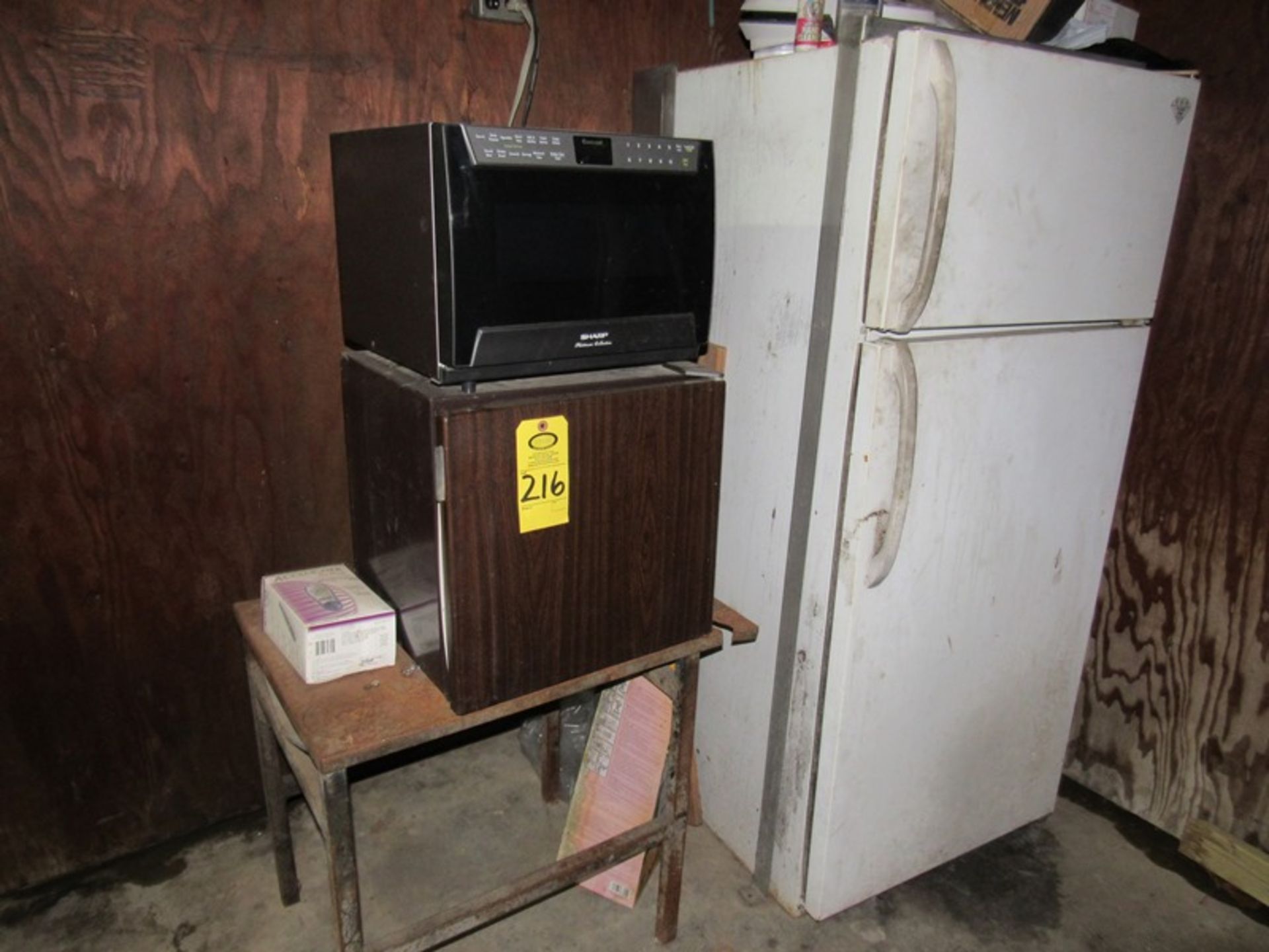 Lot Contents Garage: Refrigerators, 2-Wheel Cart, Benches, Misc. Motors, Hose Reels, Cabinets,