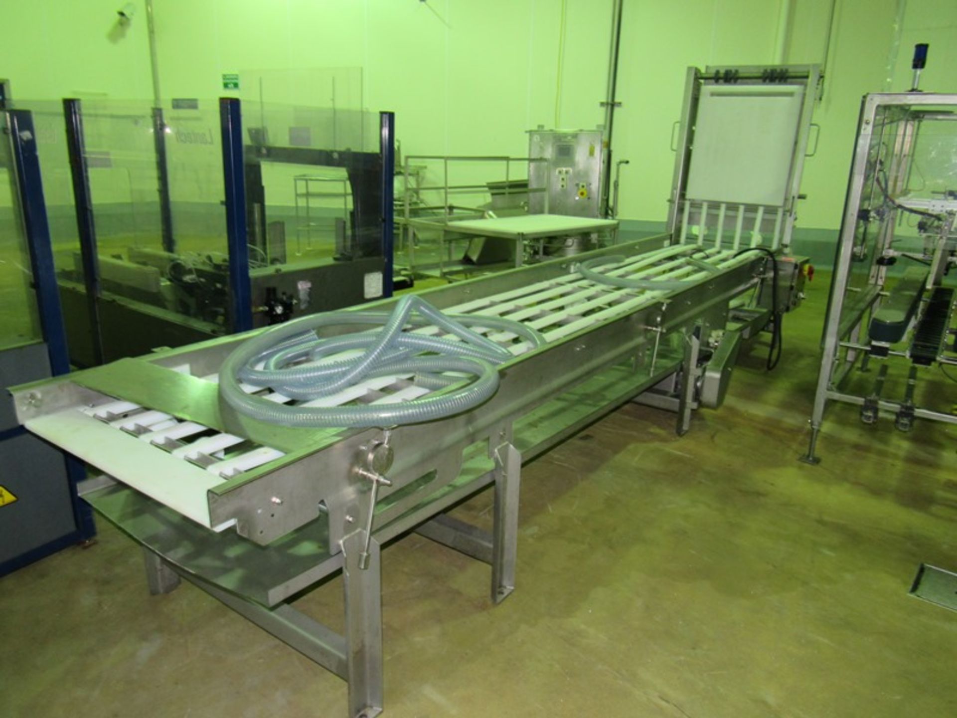 Stainless Steel Conveyor, 33" W X 22' L, (no belt) 4" long raises, stainless steel drip pan, 220