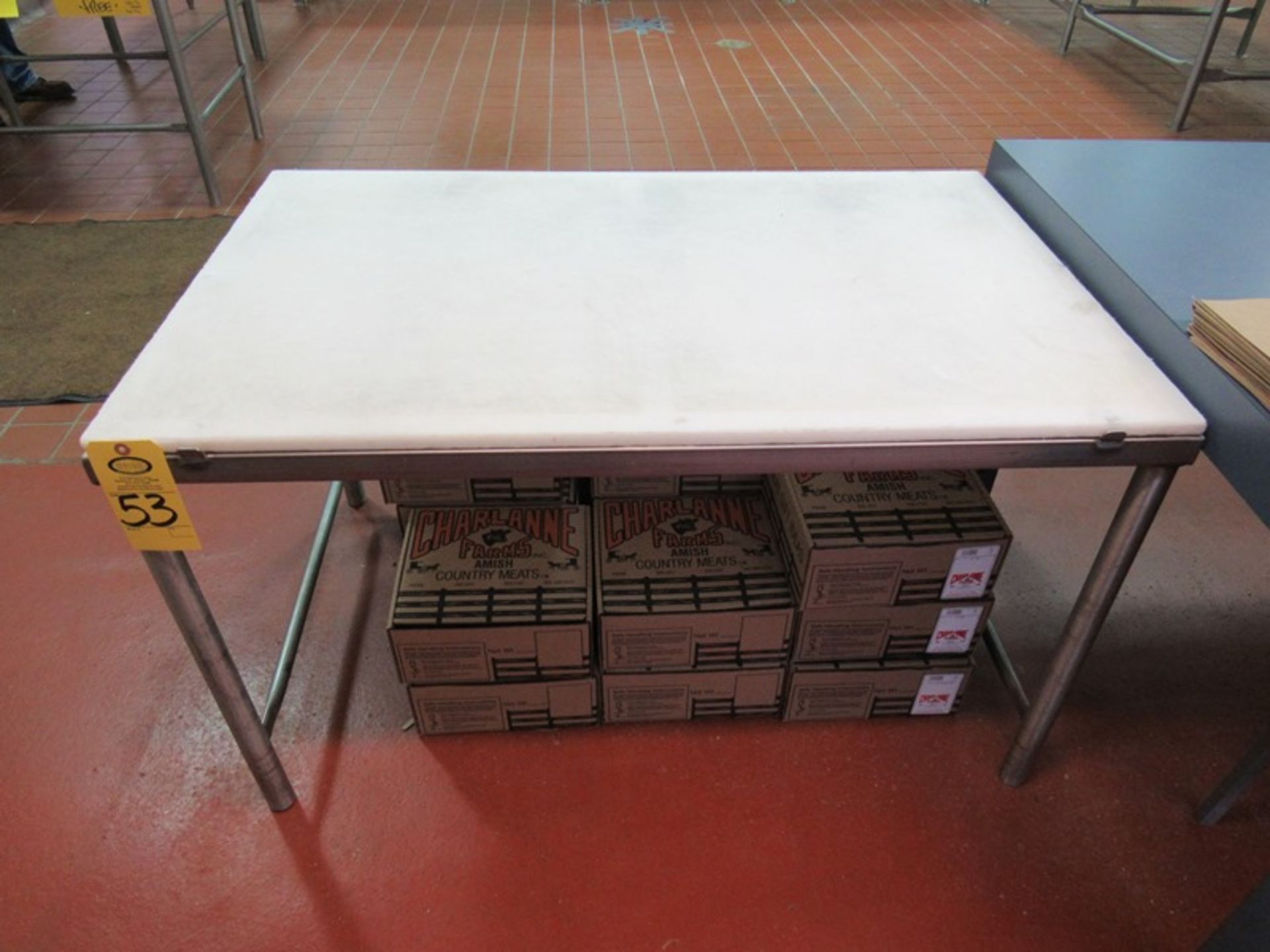 Stainless Steel Table, 30" W X 4'L poly top(Required Loading Fee $10.00 - Small Items Will Be Loaded