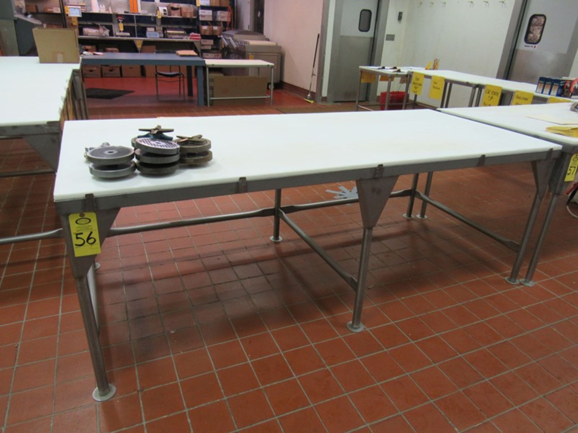 Stainless Steel Table, 42" W X 8'L poly top(Required Loading Fee $10.00 - Small Items Will Be Loaded