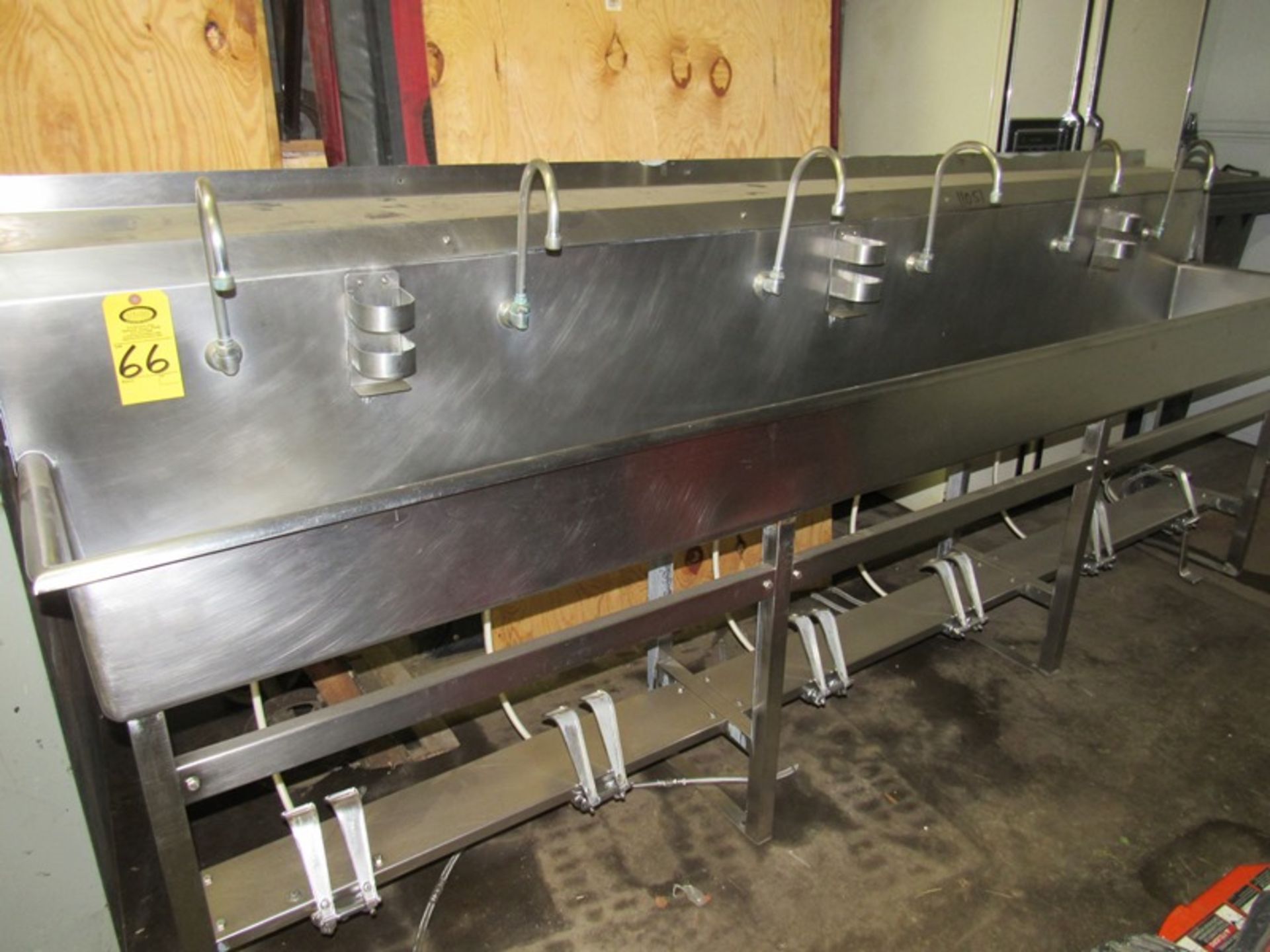 Stainless Steel Sink, 24" W X 10' L, 6 faucets, foot pedal activation, 3 soap holders