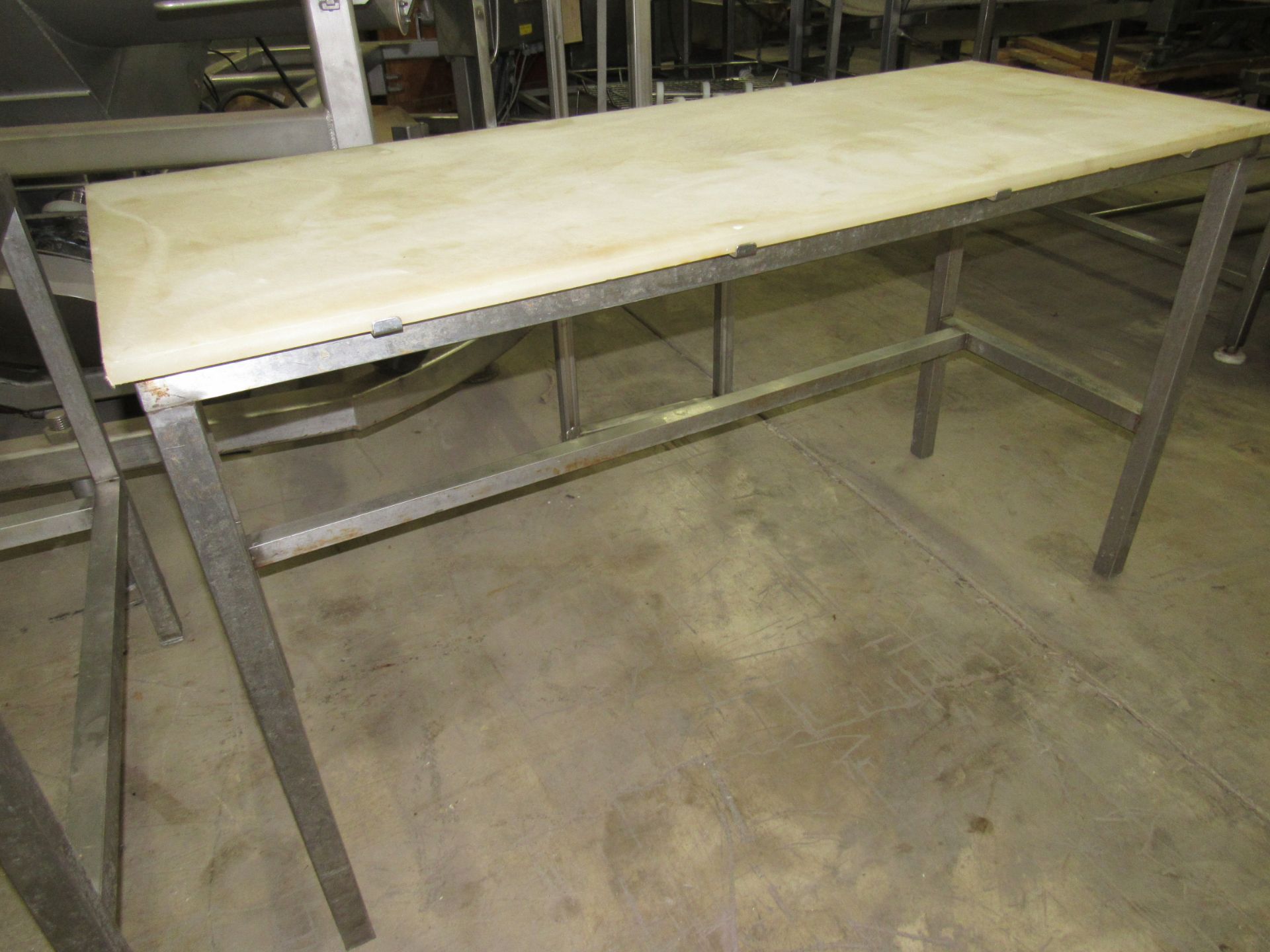 Lot of (2) Stainless Steel Tables, (1) 24" W X 60" L X 33" T, poly tops, (1) 36" W X 60" L X 33"