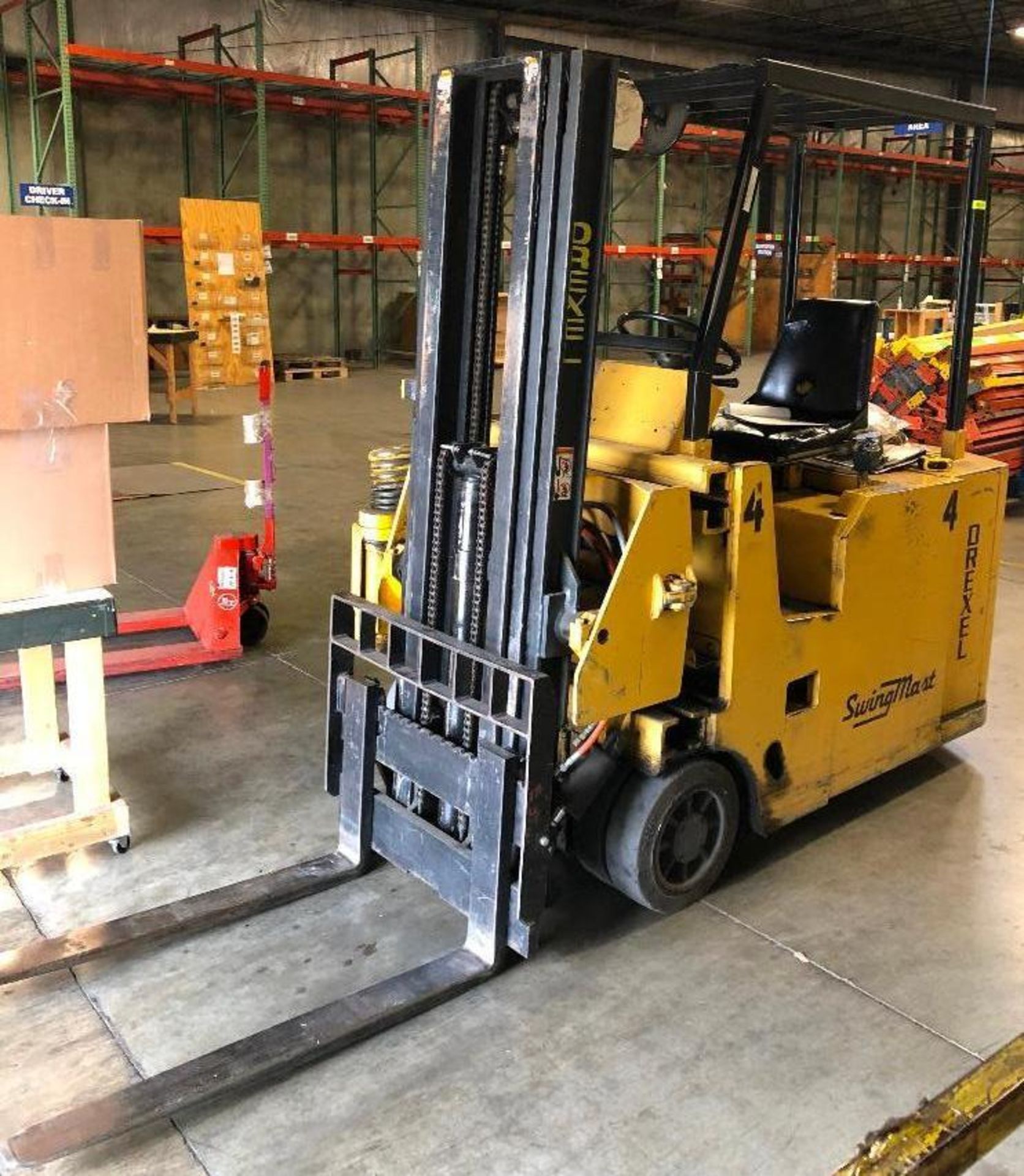 DESCRIPTION 1998 DREXEL SLT30 SWING REACH ELECTRIC FORKLIFT (CHARGER NOT INCLUDED) BRAND/MODEL DREXE