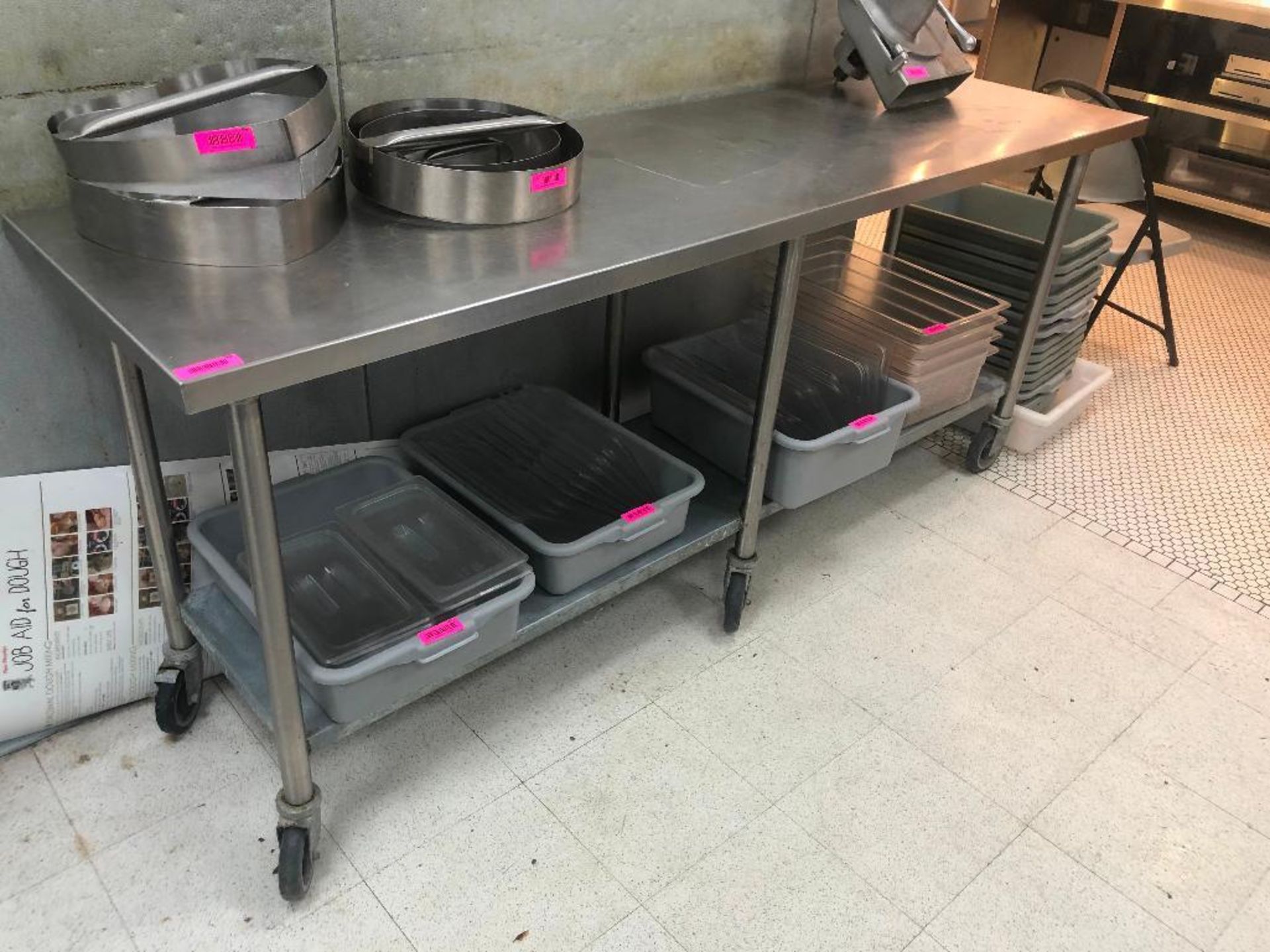 DESCRIPTION: 7' X 24" STAINLESS TABLE W/ GALVANIZED UNDER SHELF. ADDITIONAL INFORMATION: NO CONTENTS