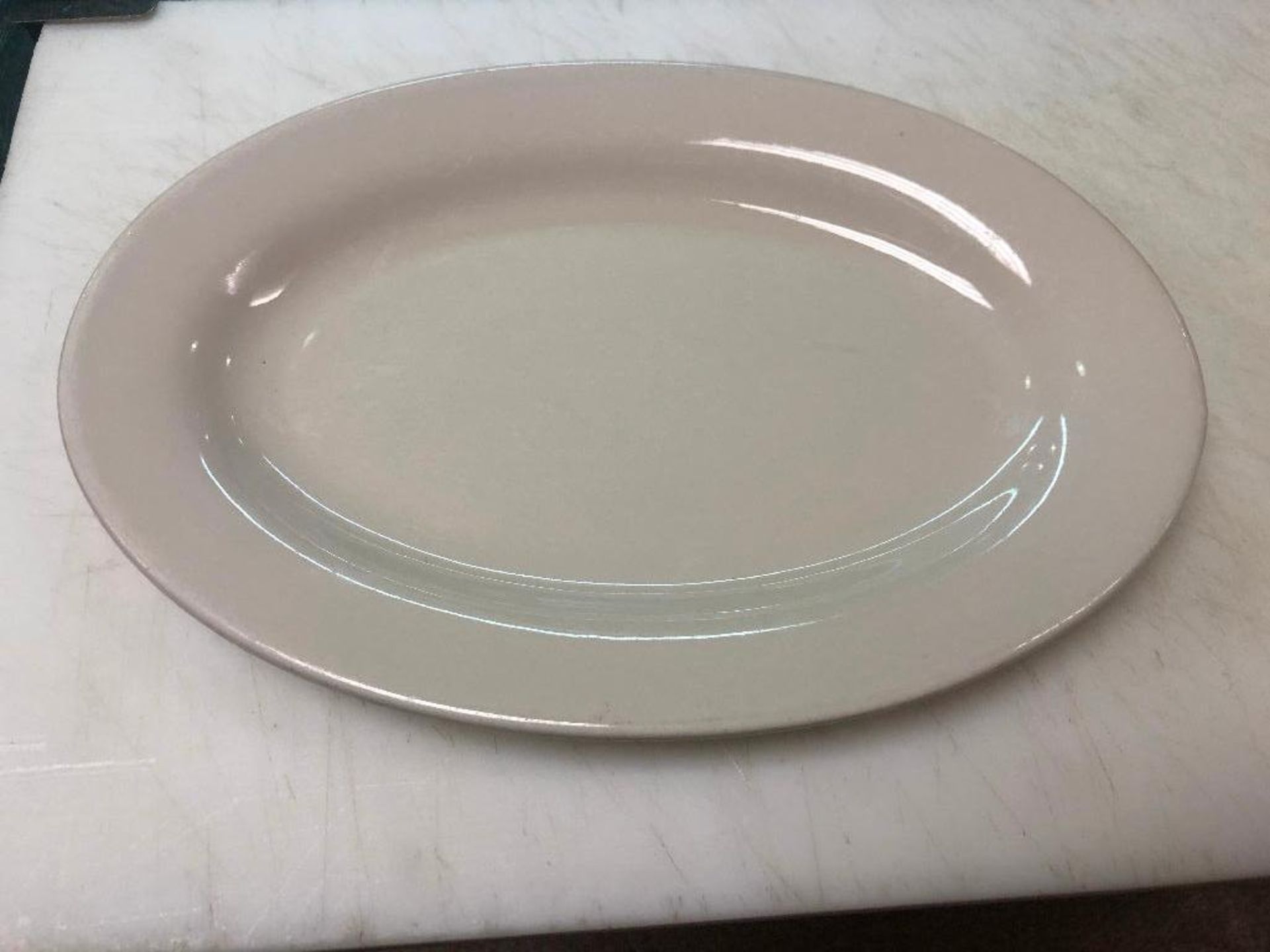 DESCRIPTION: (12) 11" CHINA PLATTERS SIZE: 11" LOCATION: KITCHEN THIS LOT IS: SOLD BY THE PIECE QTY