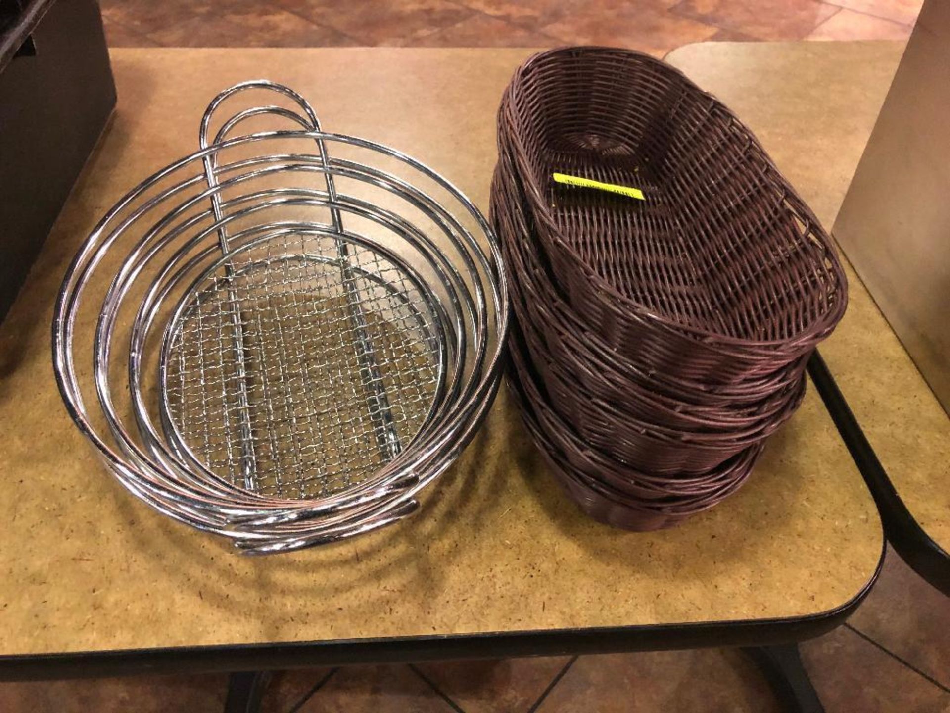 DESCRIPTION: (5) ASSORTED WICKER AND WIRE BREAD BASKETS LOCATION: MAIN SEATING THIS LOT IS: ONE MONE