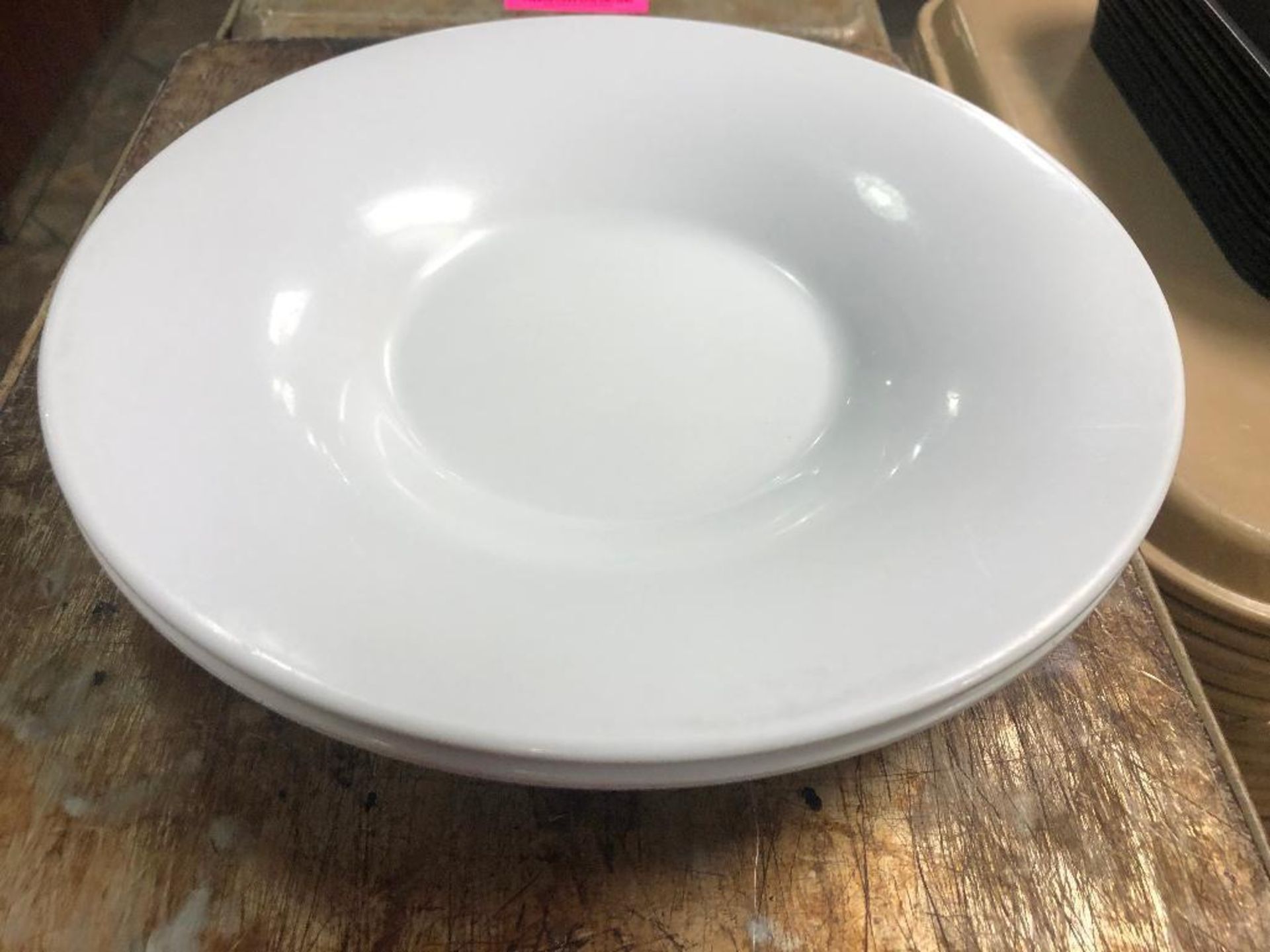 DESCRIPTION: (48) 10.5" PLASTIC PLATES. SIZE: 10.5" LOCATION: KITCHEN THIS LOT IS: SOLD BY THE PIECE