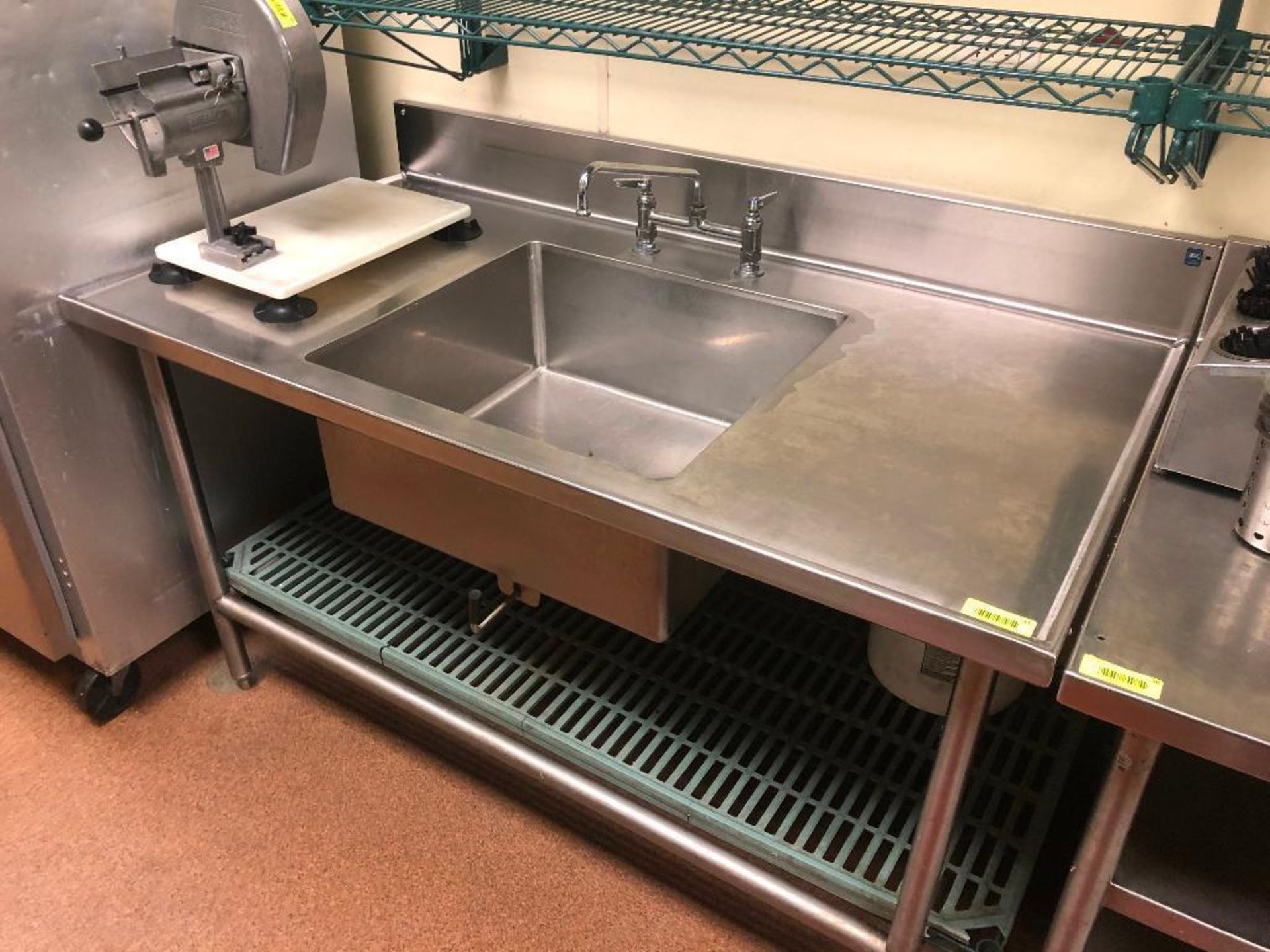 DESCRIPTION: 60" STAINLESS PREP SINK W/ SINGLE FAUCET. ADDITIONAL INFORMATION: HEAVY DUTY, W/ DRAIN