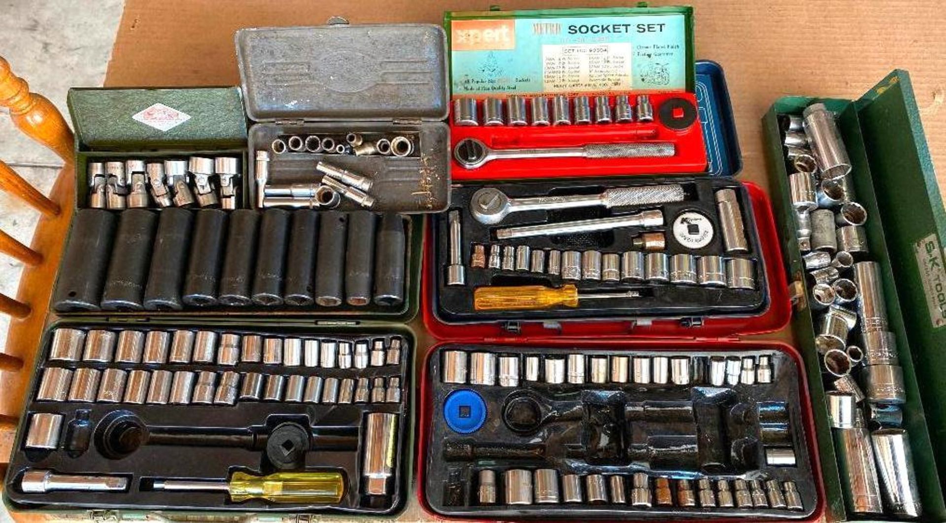 DESCRIPTION ASSORTED RATCHET SETS LOCATION GARAGE #1 THIS LOT IS ONE MONEY QUANTITY 1