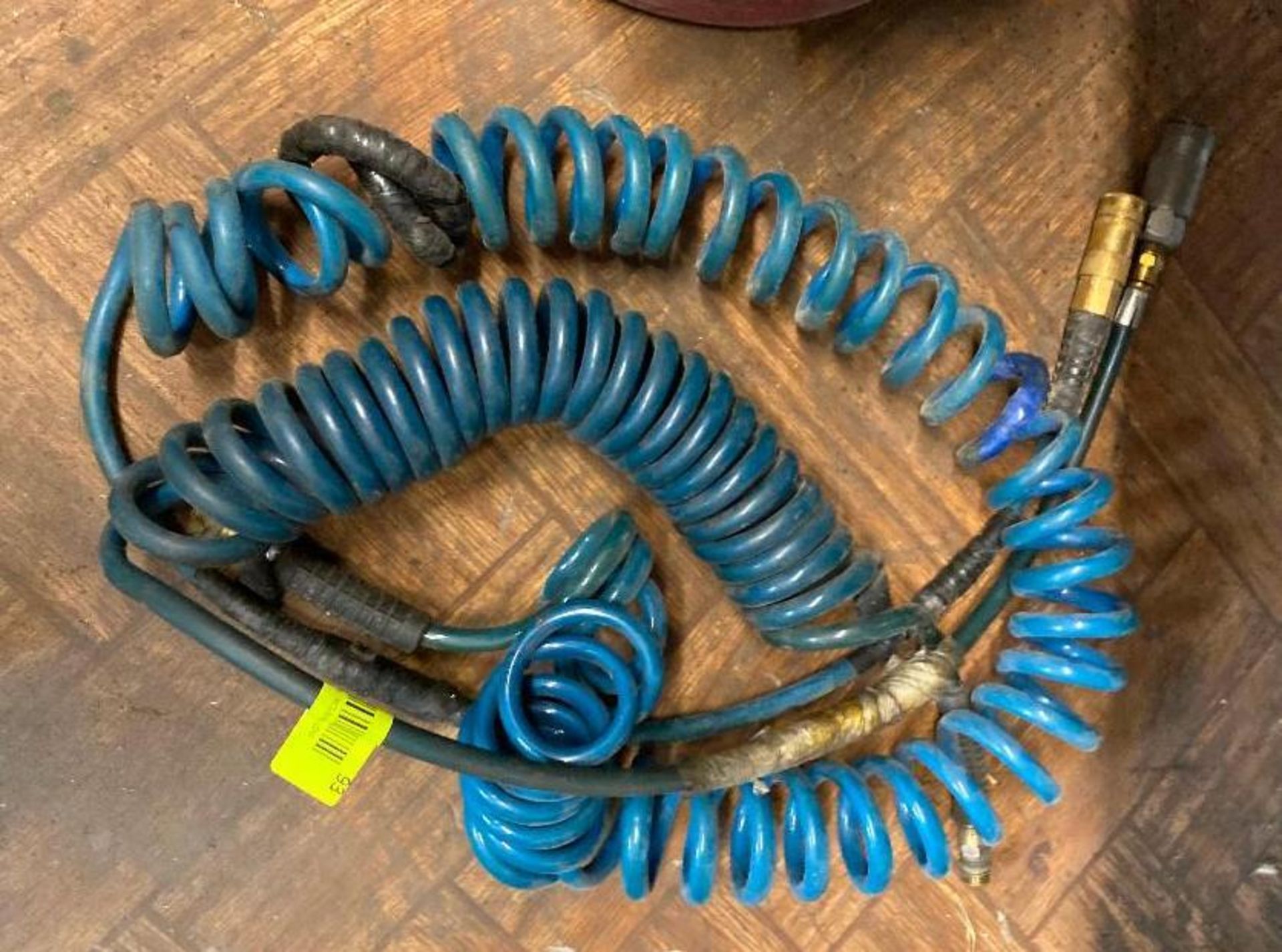 DESCRIPTION ASSORTED COILED AIR HOSES AS SHOWN LOCATION E THIS LOT IS ONE MONEY QUANTITY 1