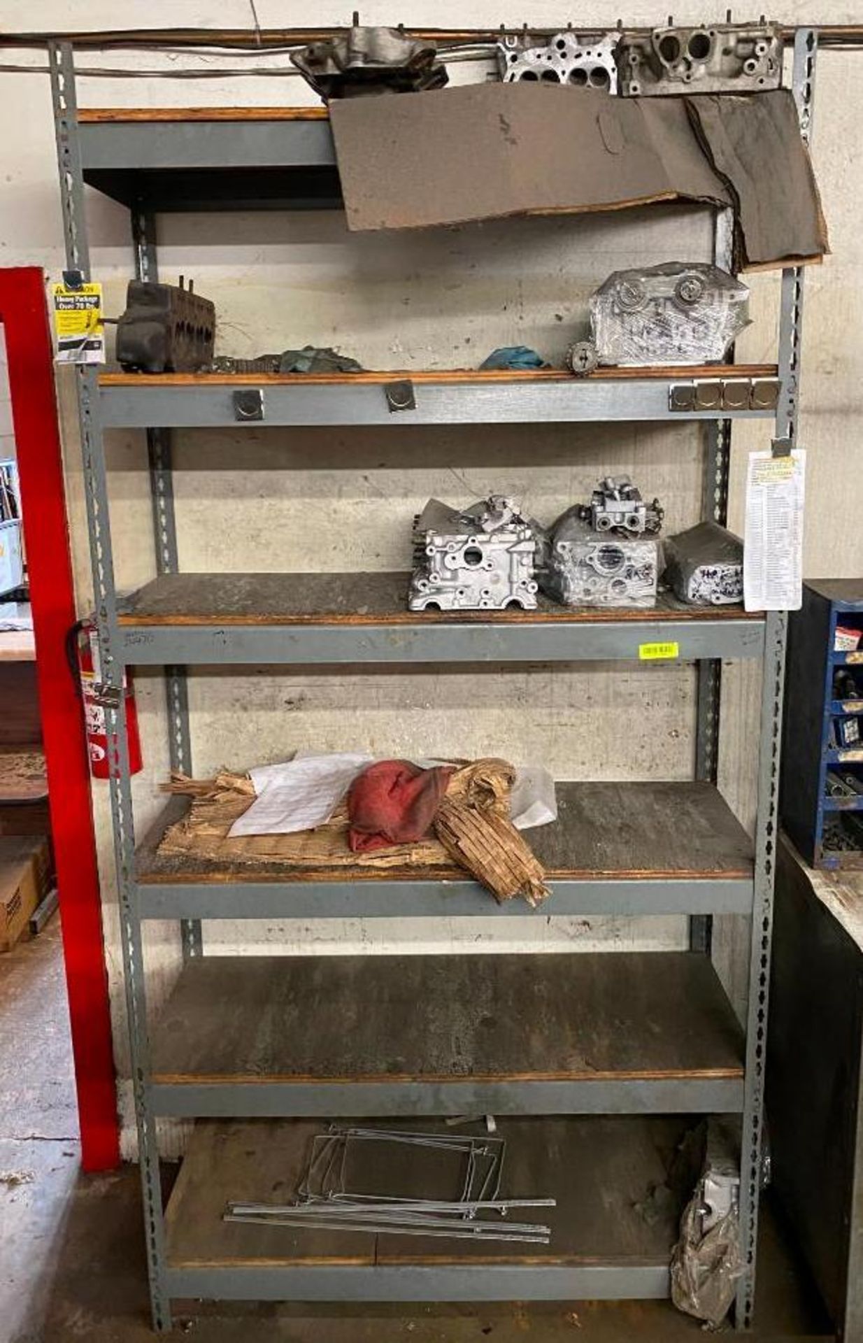 DESCRIPTION 6-TIER SHELVING UNIT WITH CONTENTS OF ASSORTED MOTOR HEADS SIZE 48"X18"X96" THIS LOT IS