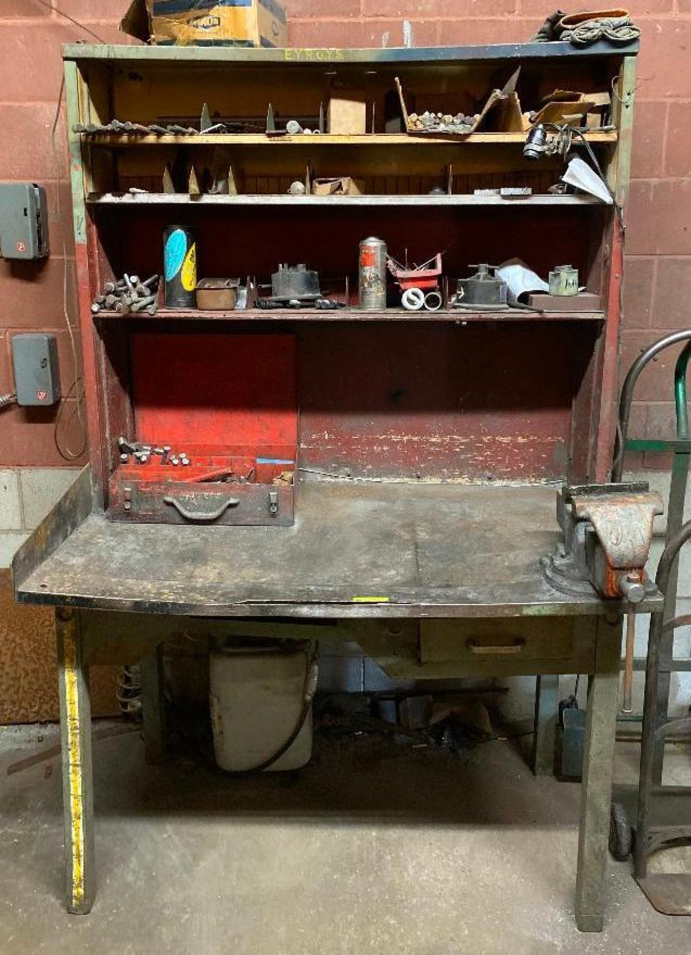 DESCRIPTION 48" X 30" X 74" WORK BENCH W/ TABLE MOUNTED VISE (CONTENTS INCLUDED) LOCATION D THIS LOT