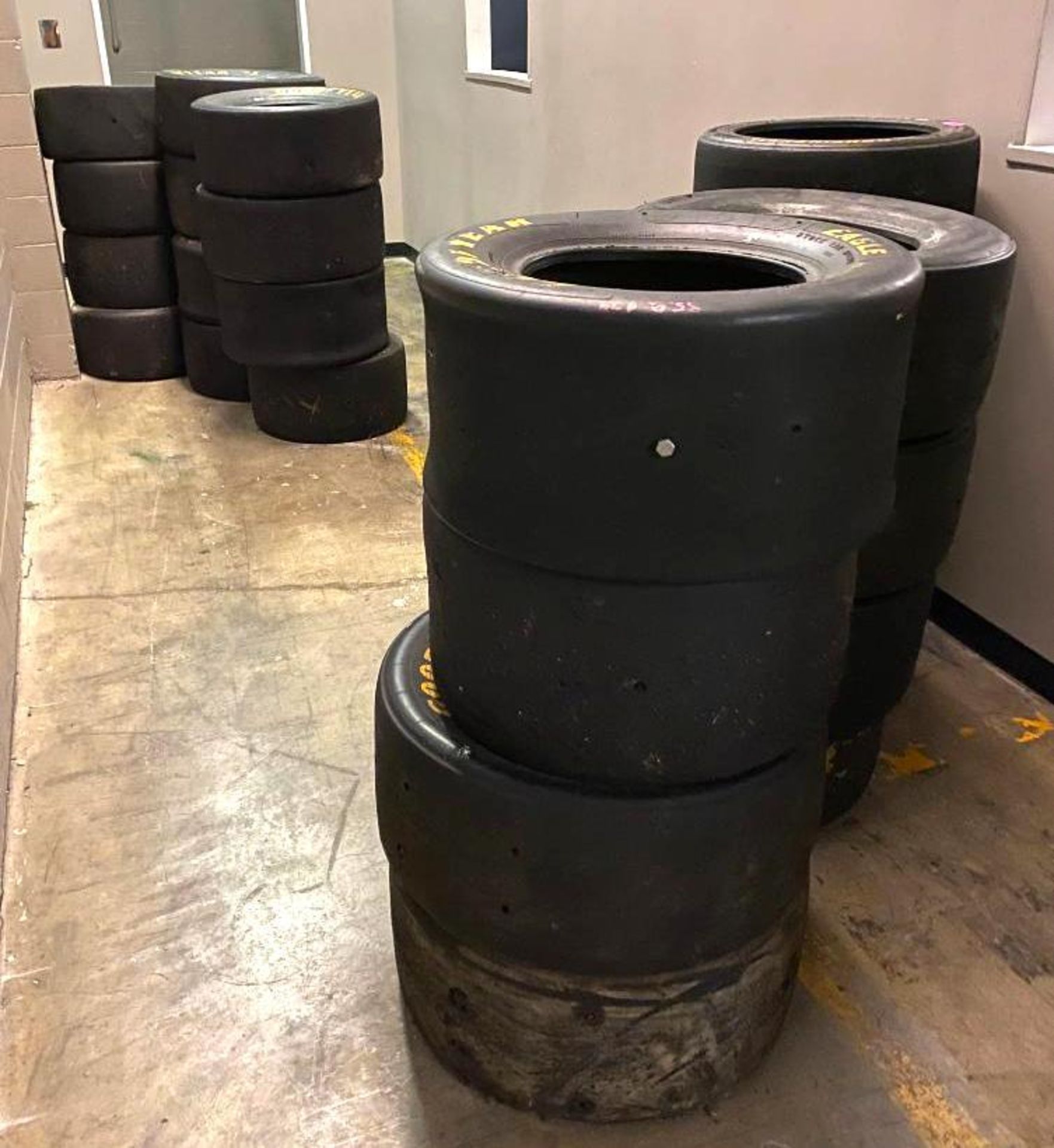 DESCRIPTION: ASSORTED RACE CAR TIRES AS SHOWN THIS LOT IS: ONE MONEY QTY: 1