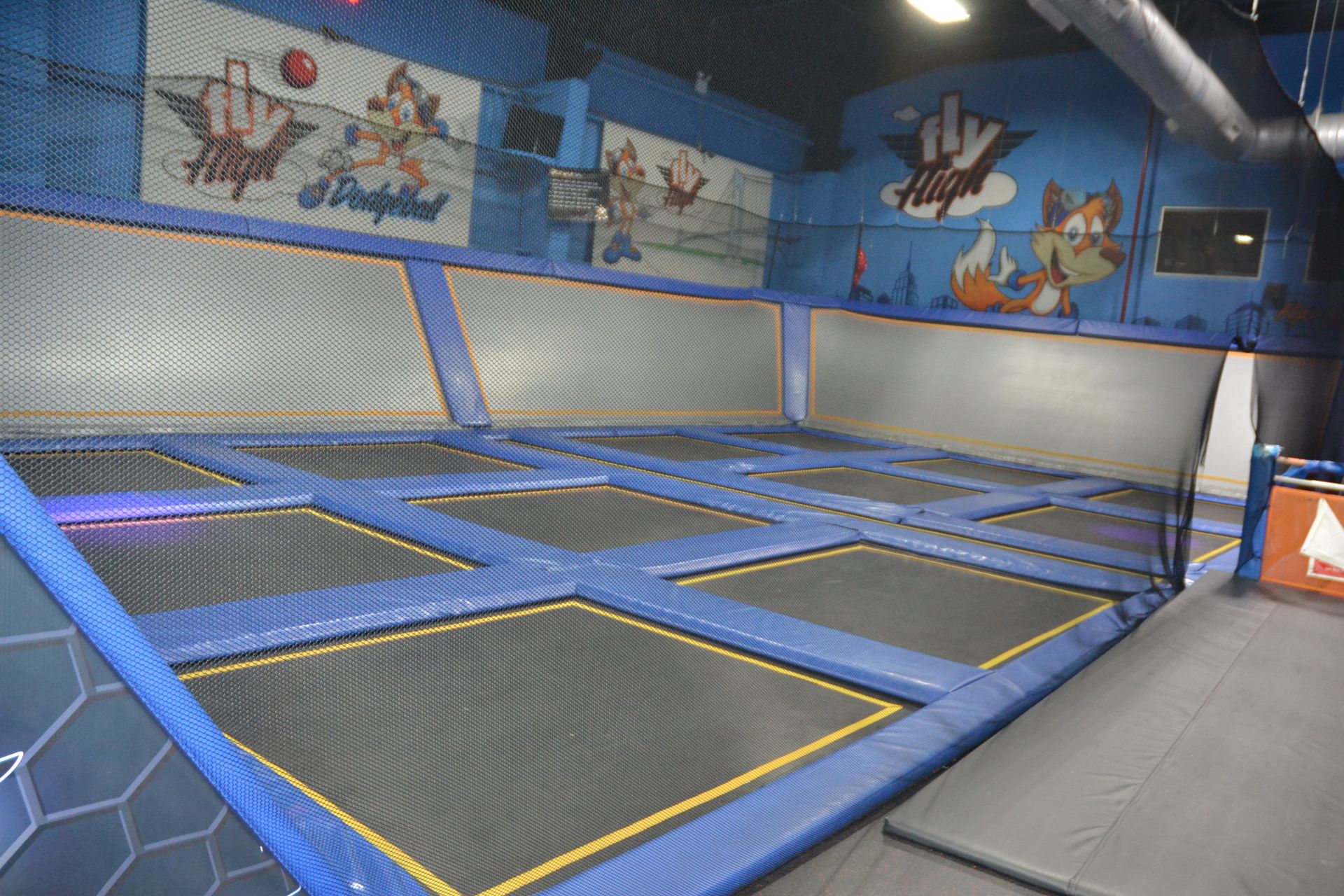 Trampoline Area Including: (12) 9' x 8' Trampolines, (1) 28' x 2 1/2' Trampoline, (4) Wall - Image 4 of 4