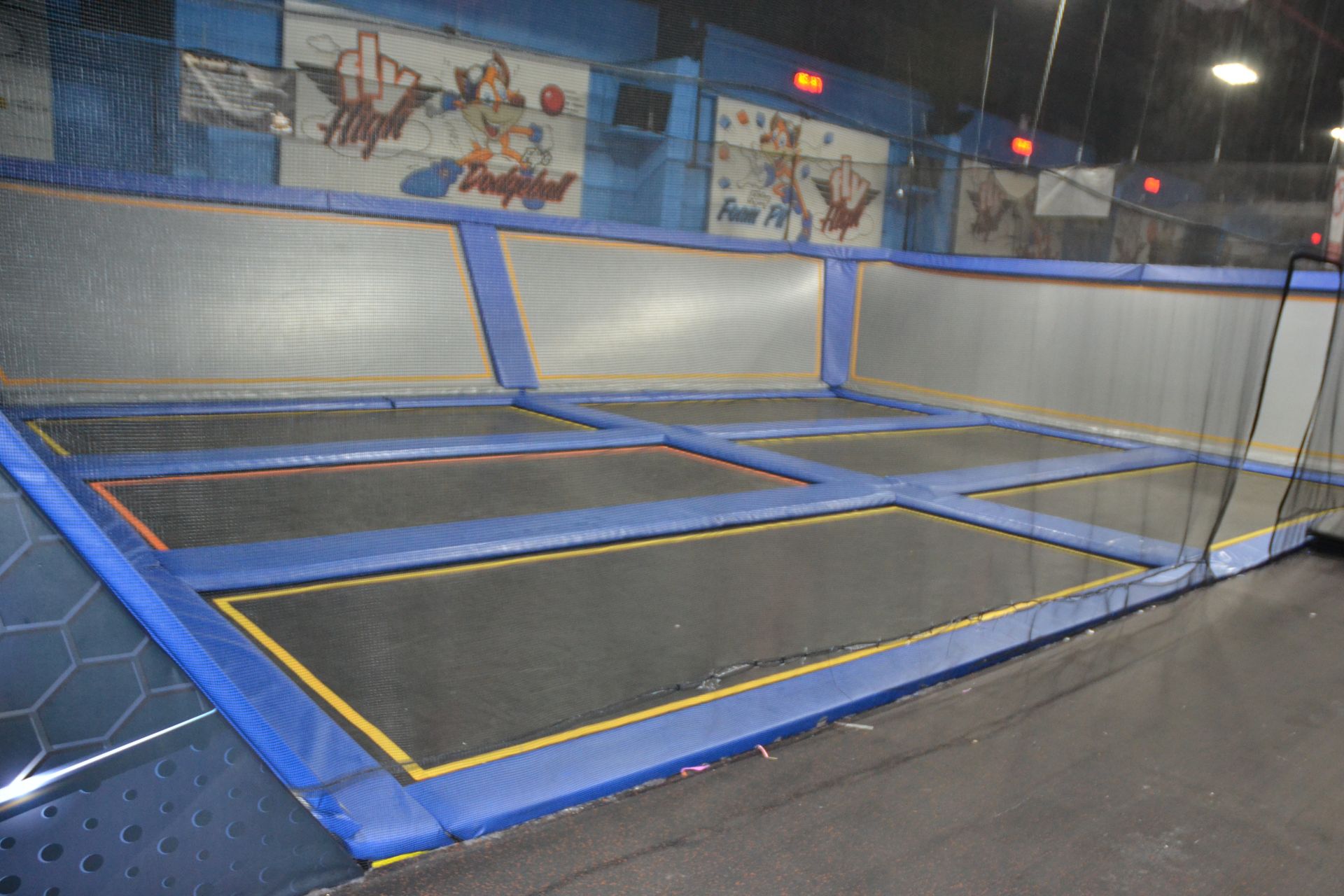 Trampoline Area Including: (6) 17 1/2' x 7 1/2' Trampolines, (4) Wall Trampolines), Netting &