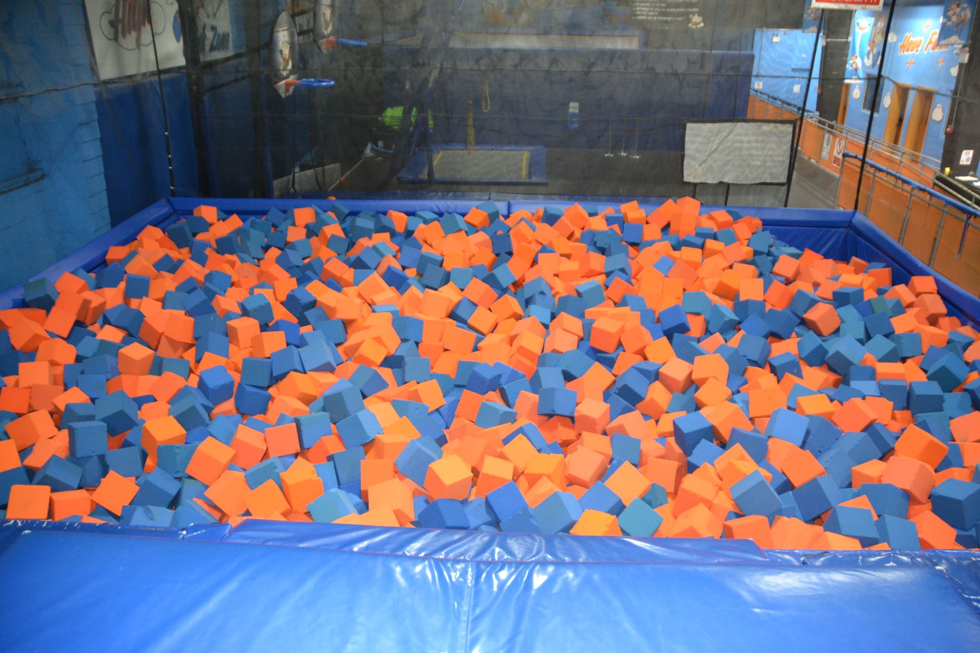 Trampoline Foam Pit Area Including: (2) 12' x 6' Trampolines, (1) 6' x 3' Trampoline, (1) 12' x 6'