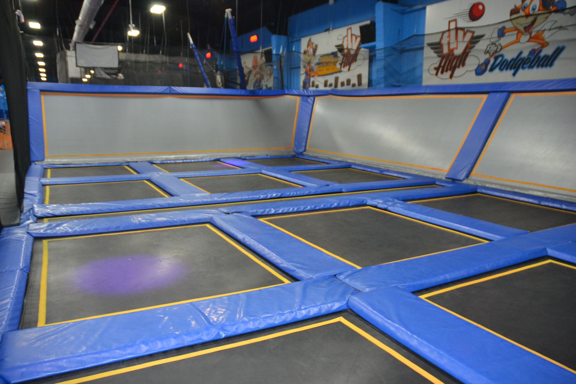 Trampoline Area Including: (12) 9' x 8' Trampolines, (1) 28' x 2 1/2' Trampoline, (4) Wall - Image 2 of 4