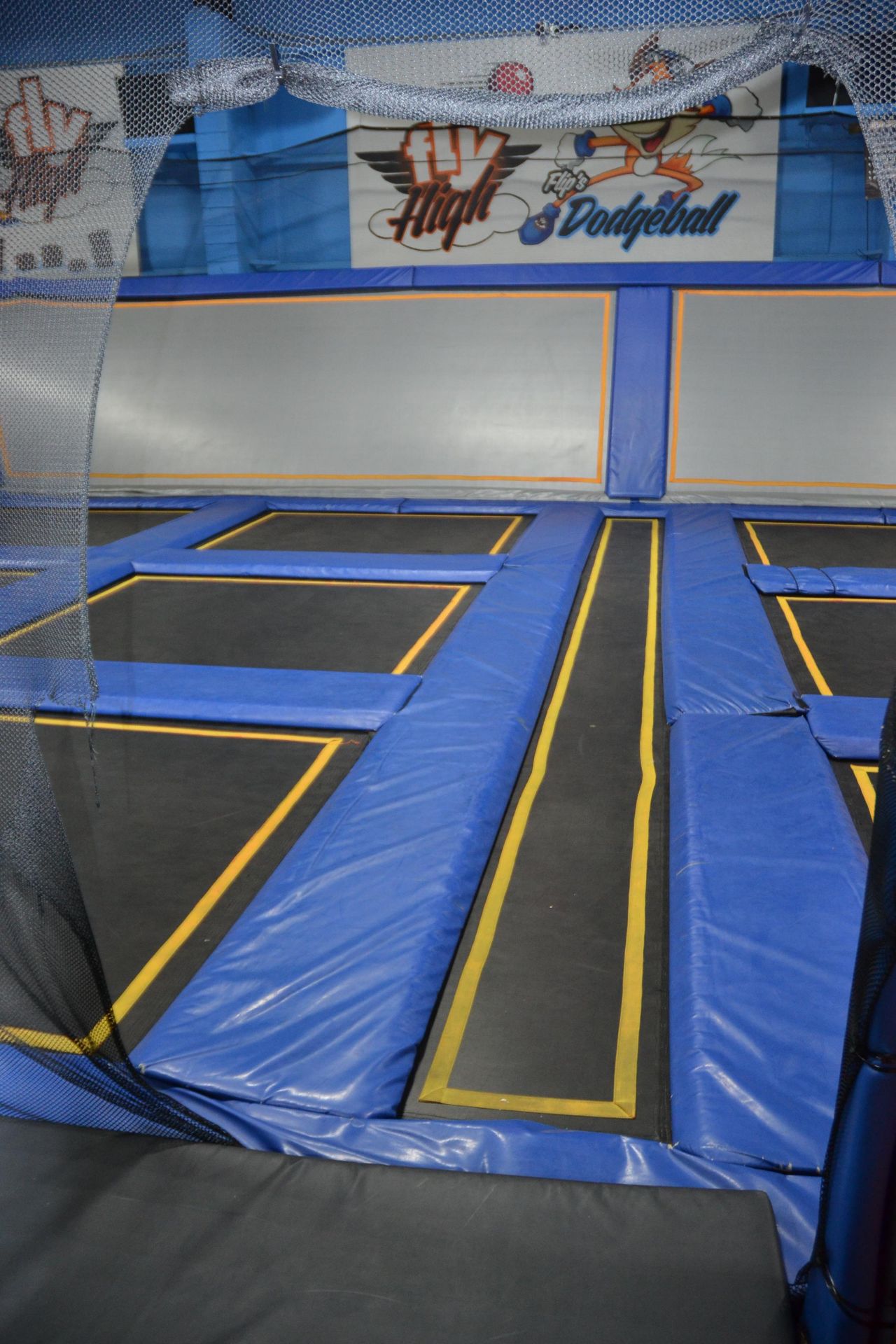 Trampoline Area Including: (12) 9' x 8' Trampolines, (1) 28' x 2 1/2' Trampoline, (4) Wall - Image 3 of 4