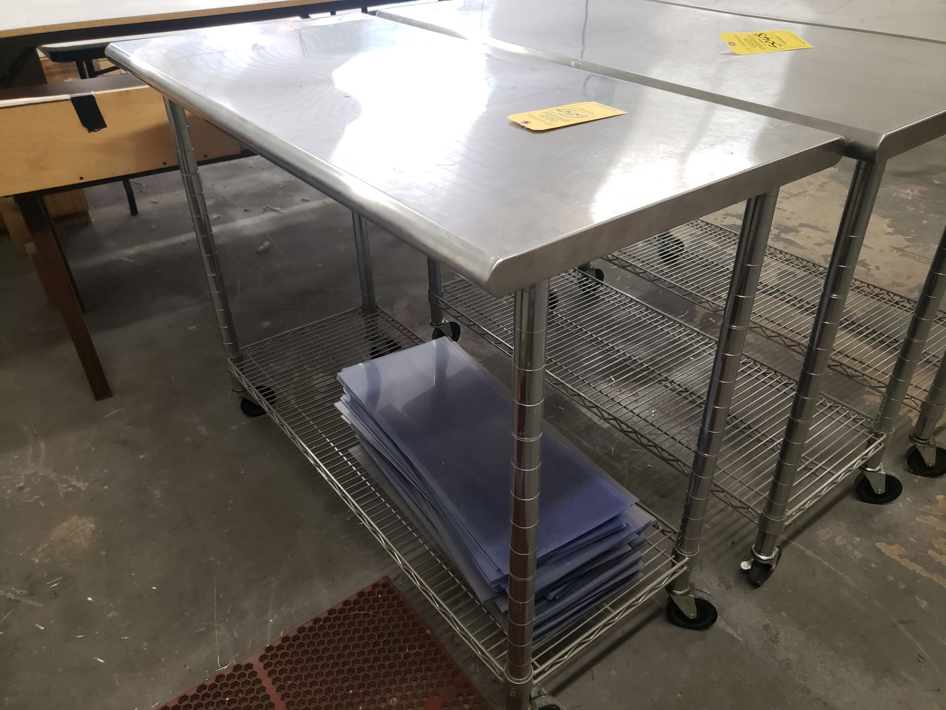 STAINLESS STEEL ROLLING TABLE (LOCATED AT: 16335 LIMA ROAD BLDG. 4 HUNTERTOWN, IN 46748)