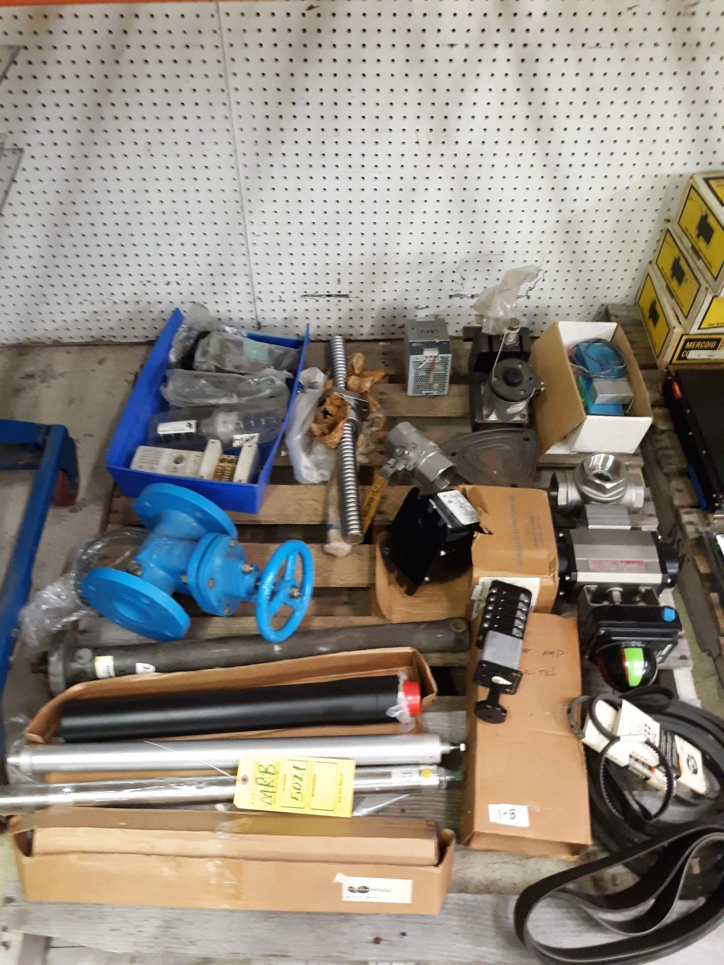 PALLET OF MISC. ITEMS: 2½" CAST IRON VALVE; MISC. BELTS; NUMATIC CYCLINDERS; DONGAN TRANSFORMER;
