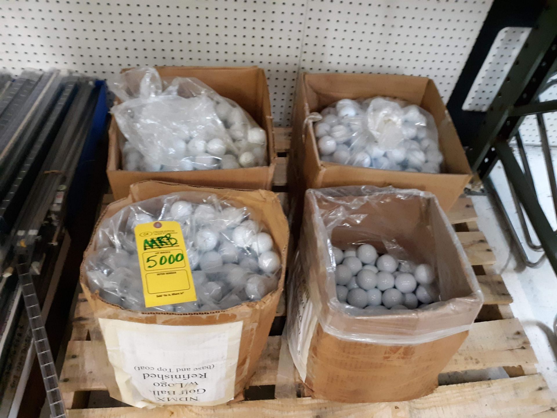 (4) BOXES OF GOLF BALLS (APPROX. 85 DOZEN) 3 BOXES NDMX2 W/ LOGOS & 1 BOX UNPRINTED