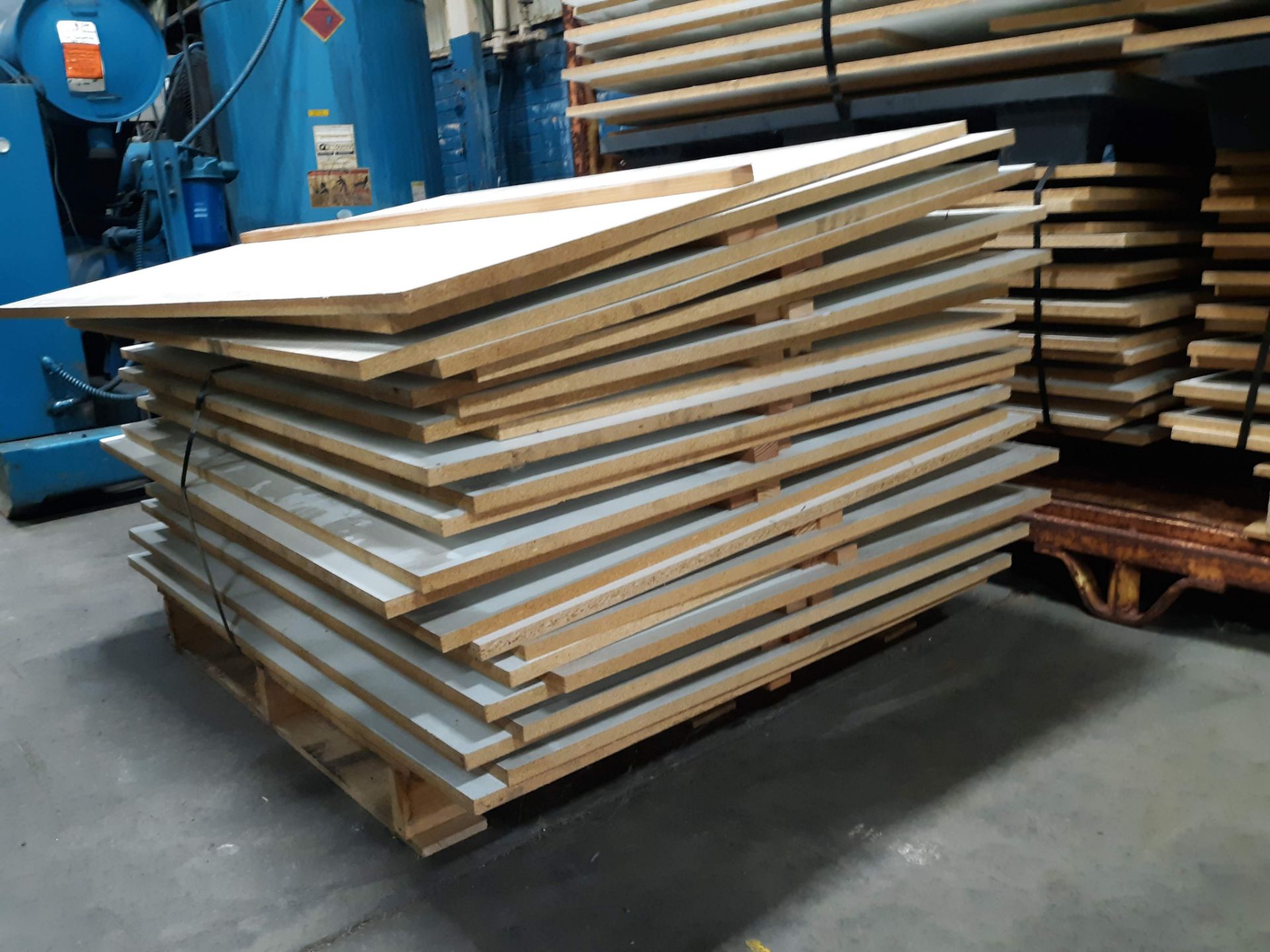 LOT OF APPROX (100) PARTICLE BOARDS (LAMINATED 36"X48"X5/8") RACKS INCLUDED - Image 2 of 2