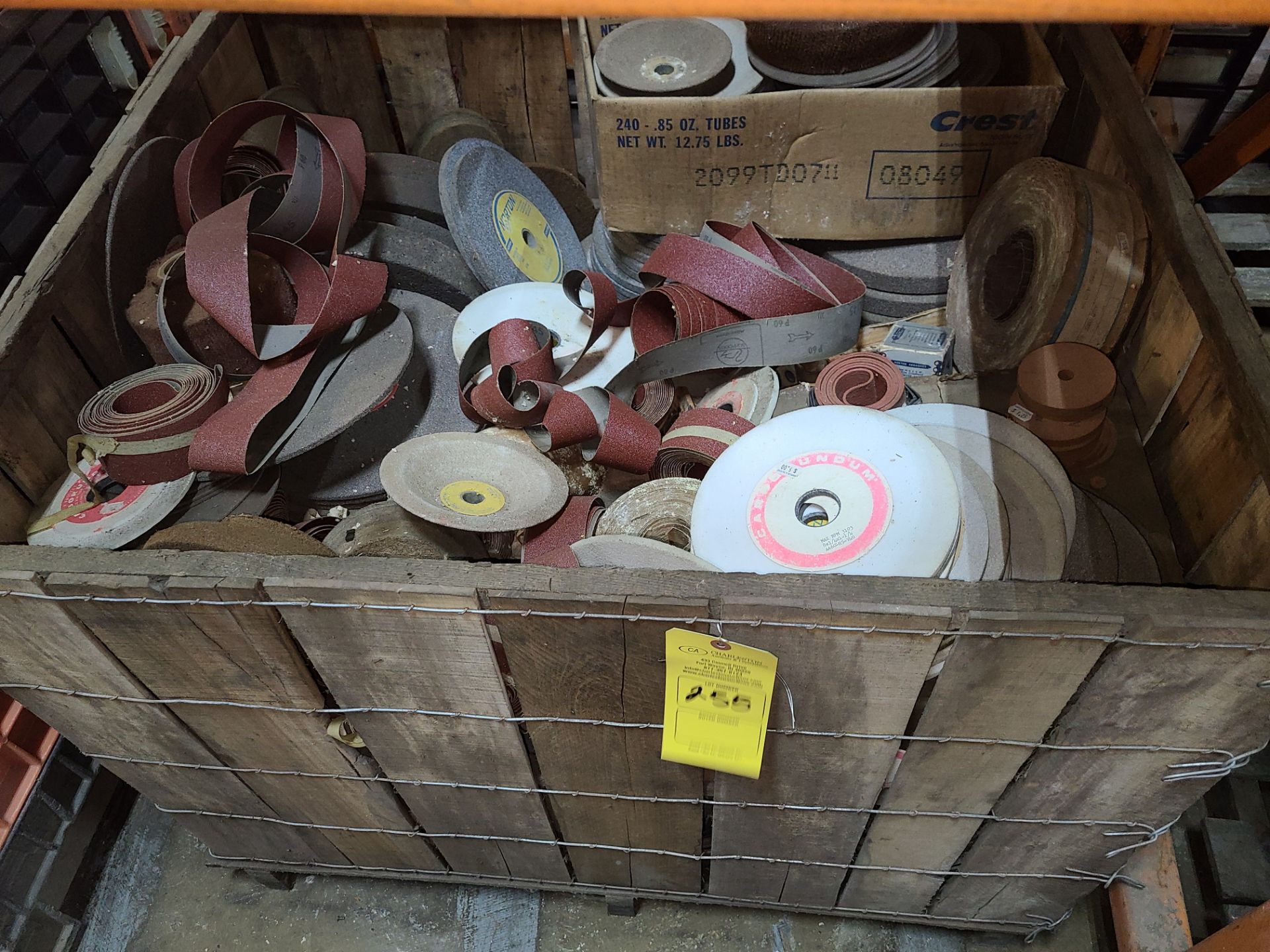 CRATE OF GRINDING WHEELS + SANDPAPER