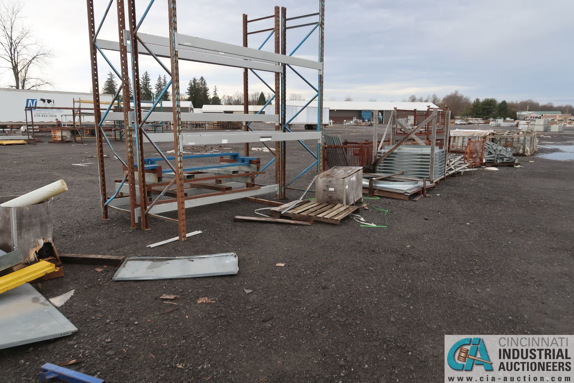 (LOT) BALANCE OF RAW MATERIAL AND FABRICATED PARTS AT BACK OF LOT AND UP TO AND AROUND TRAILERS ** - Image 9 of 18