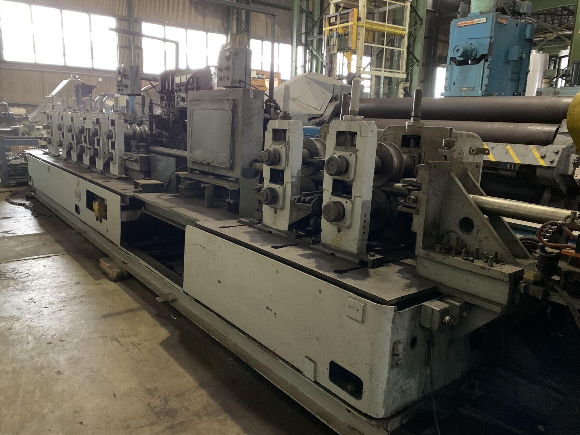 YODER MODEL M3 TUBE MILL; S/N 39774 68259-1, 9-STAND 7-DRIVEN FORMING STANDS, (2) SIZING STANDS,