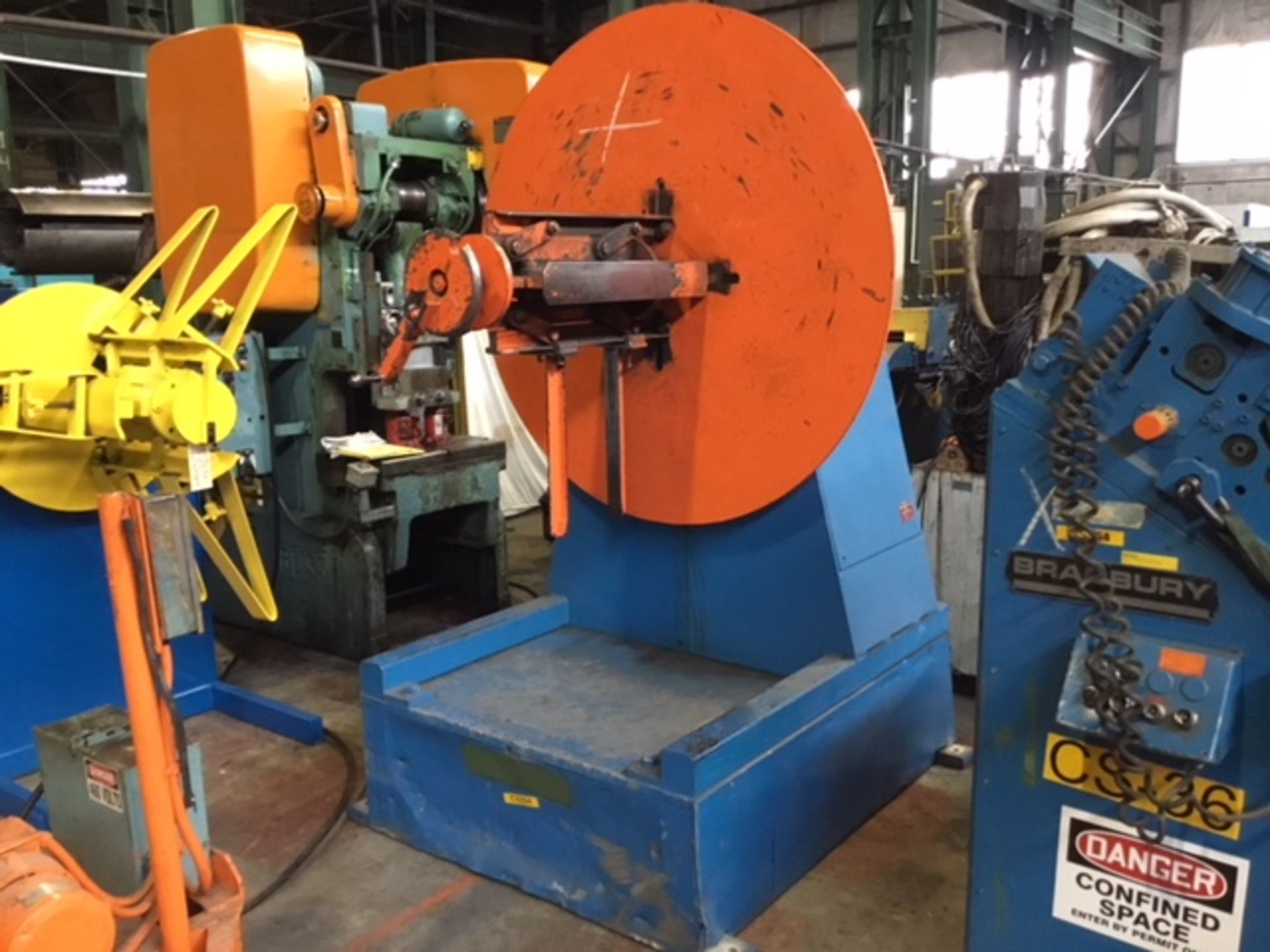 5,000 LB. BRADBURY MODEL 300-24 UNCOILER; S/N 17310, COIL WIDTH 24", MAX OD 60", ID RANGE 15.5" -