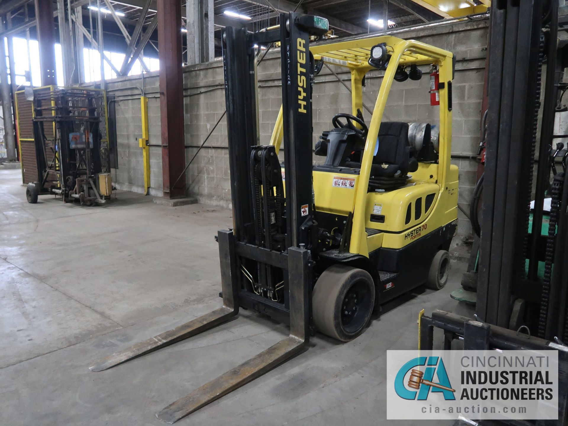 7,000 LB HYSTER MODEL S70FT LP GAS SOLID TIRE LIFT TRUCK; S/N G187V02112M, 122" LIFT HEIGHT,