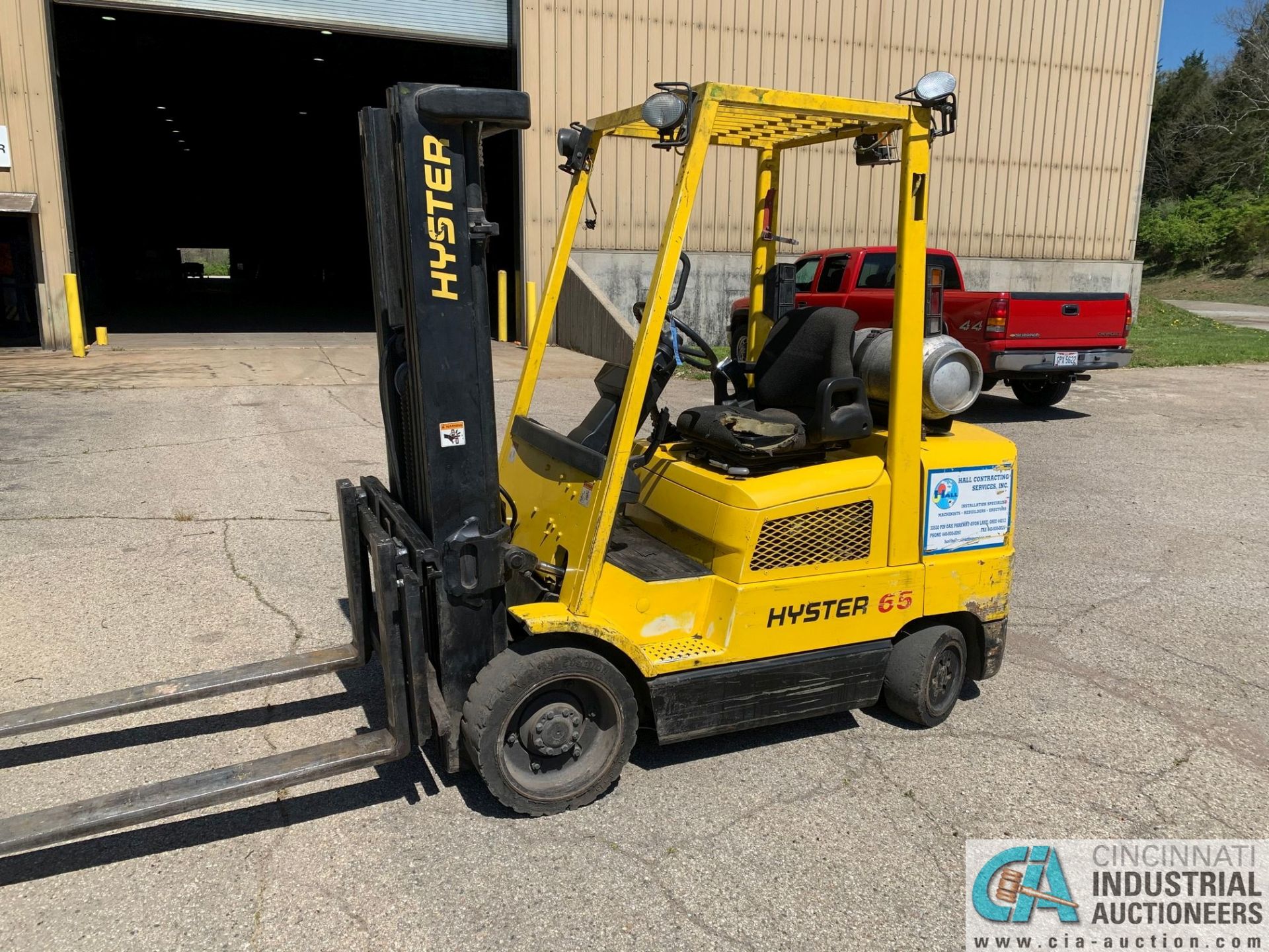 6,500 LB. HYSTER MODEL S65XM LP GAS SOLID TIRE LIFT TRUCK; S/N D187V32192B, 84" X 164" THREE-STAGE