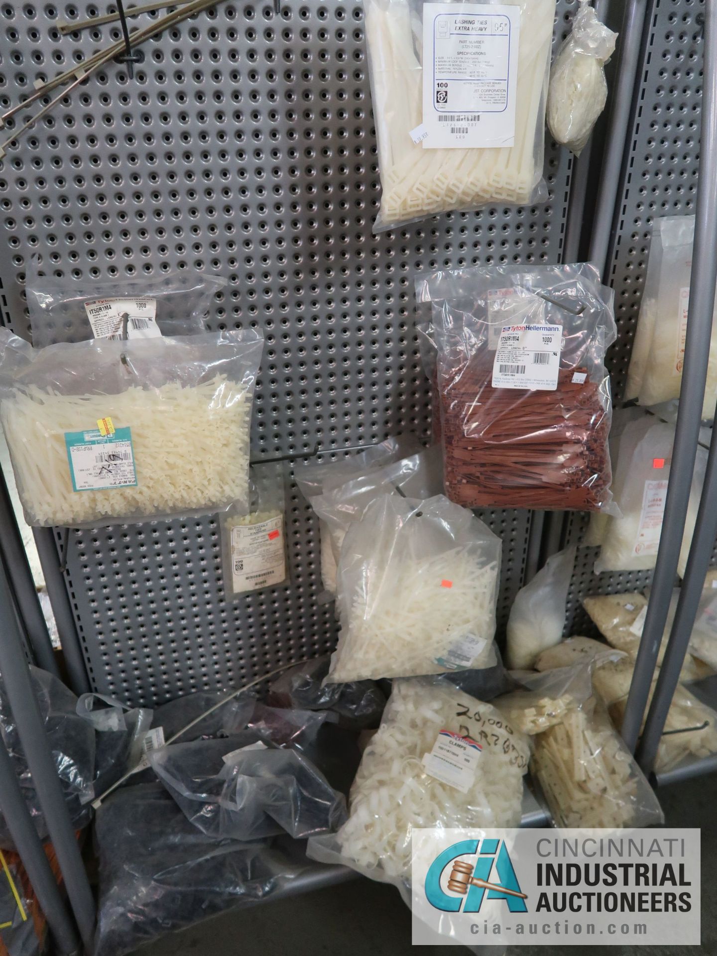 CONTENTS OF (11) DISPLAY RACKS INCLUDING CABLE TIES, STEEL CLAMPS, BATTERIES, HORN SPEAKERS, TV WALL - Image 11 of 13