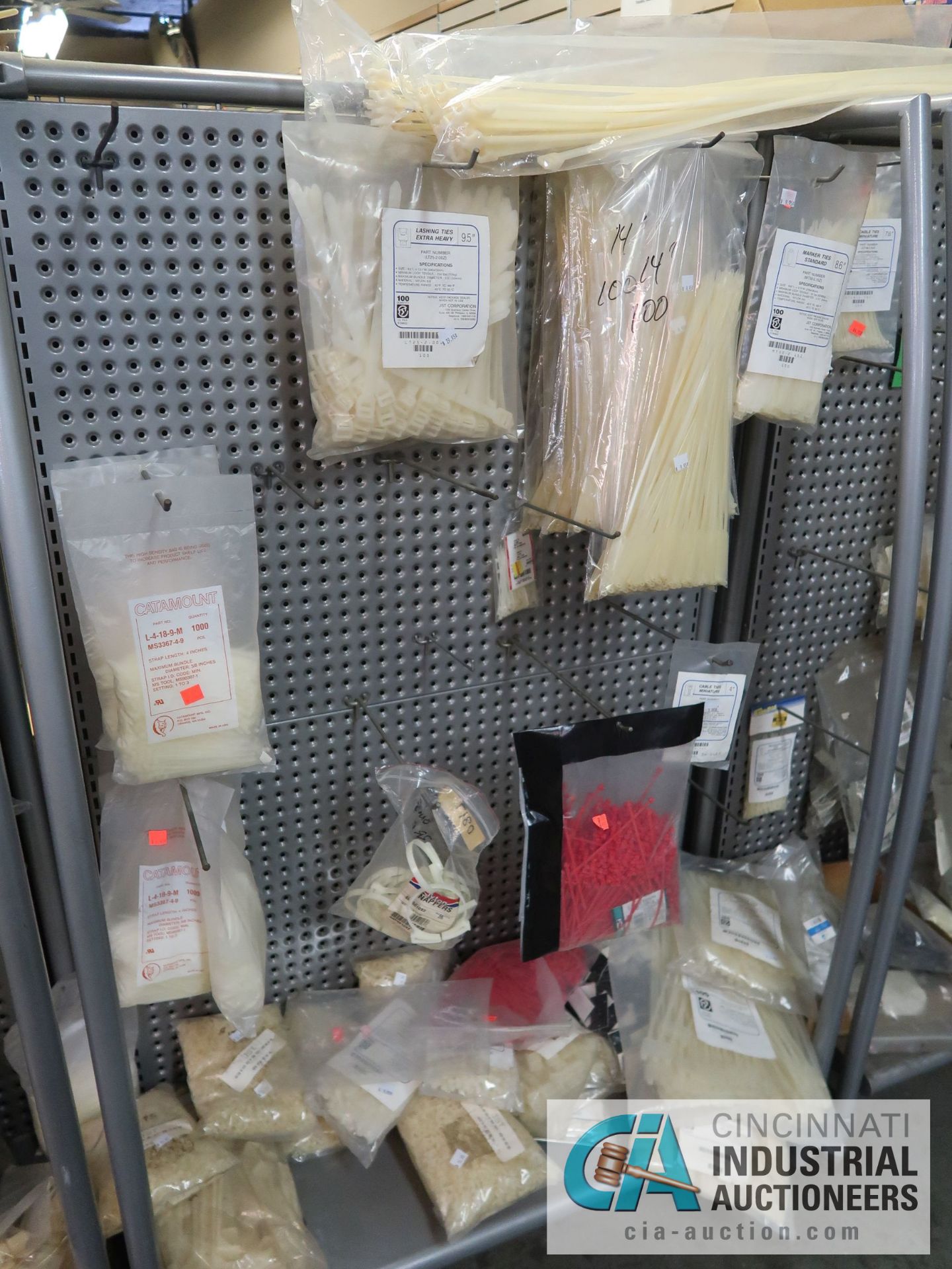 CONTENTS OF (11) DISPLAY RACKS INCLUDING CABLE TIES, STEEL CLAMPS, BATTERIES, HORN SPEAKERS, TV WALL - Image 12 of 13