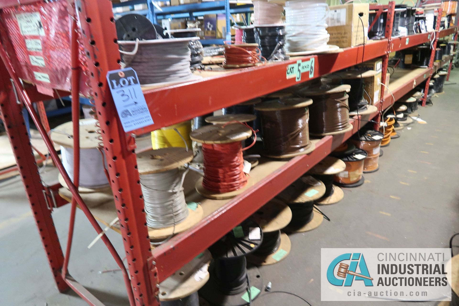 (LOT) LARGE QUANTITY OF COAX CABLE ON (3) SECTIONS RED RACK - APPROX. (130) SPOOLS - SOLD BY THE - Image 11 of 14