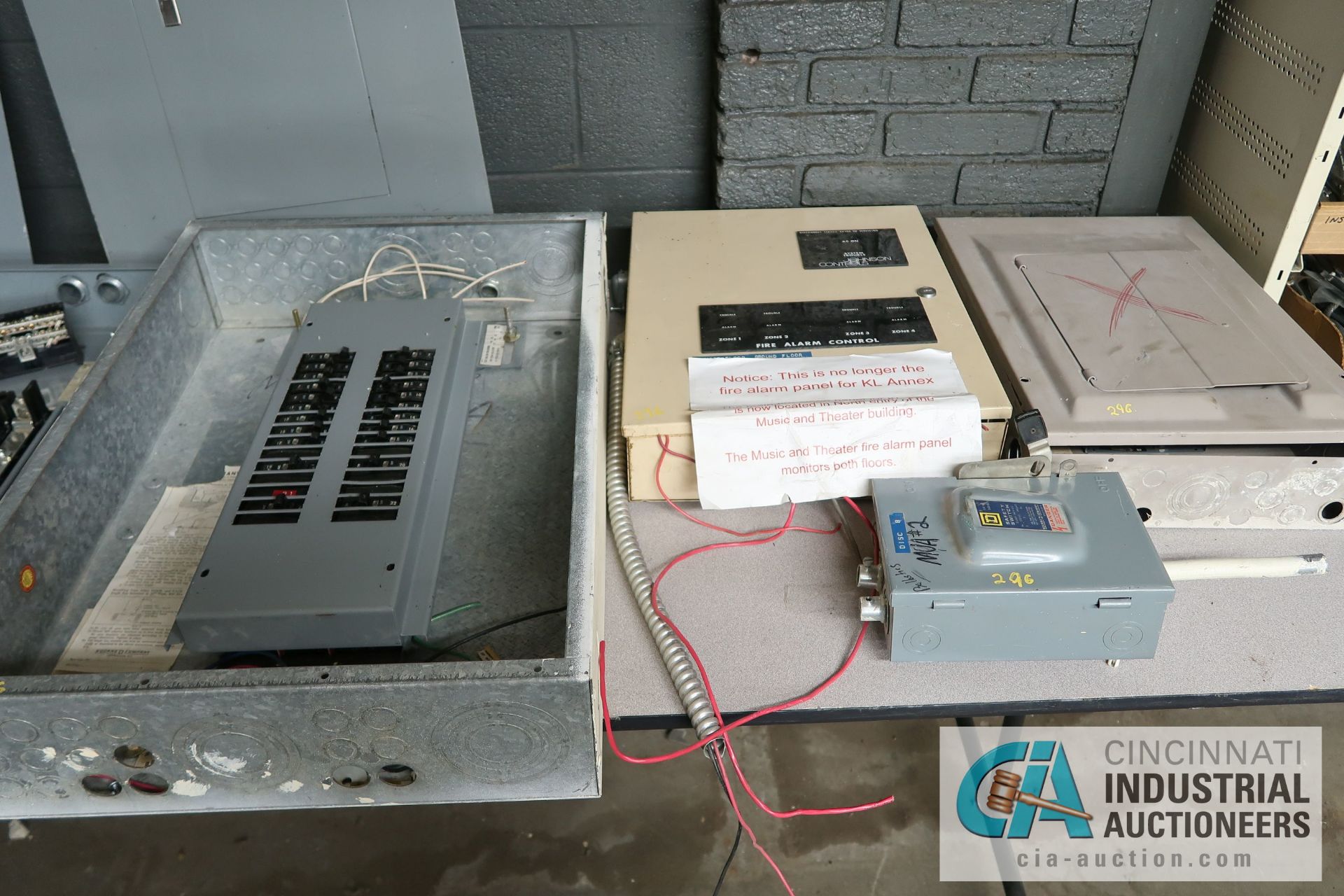 (LOT) ASSORTED ELECTRICAL ALONG THE WALL - TABLE WITH SERVICE PANELS BY SQUARE D, SHELF UNITS WITH - Image 2 of 12