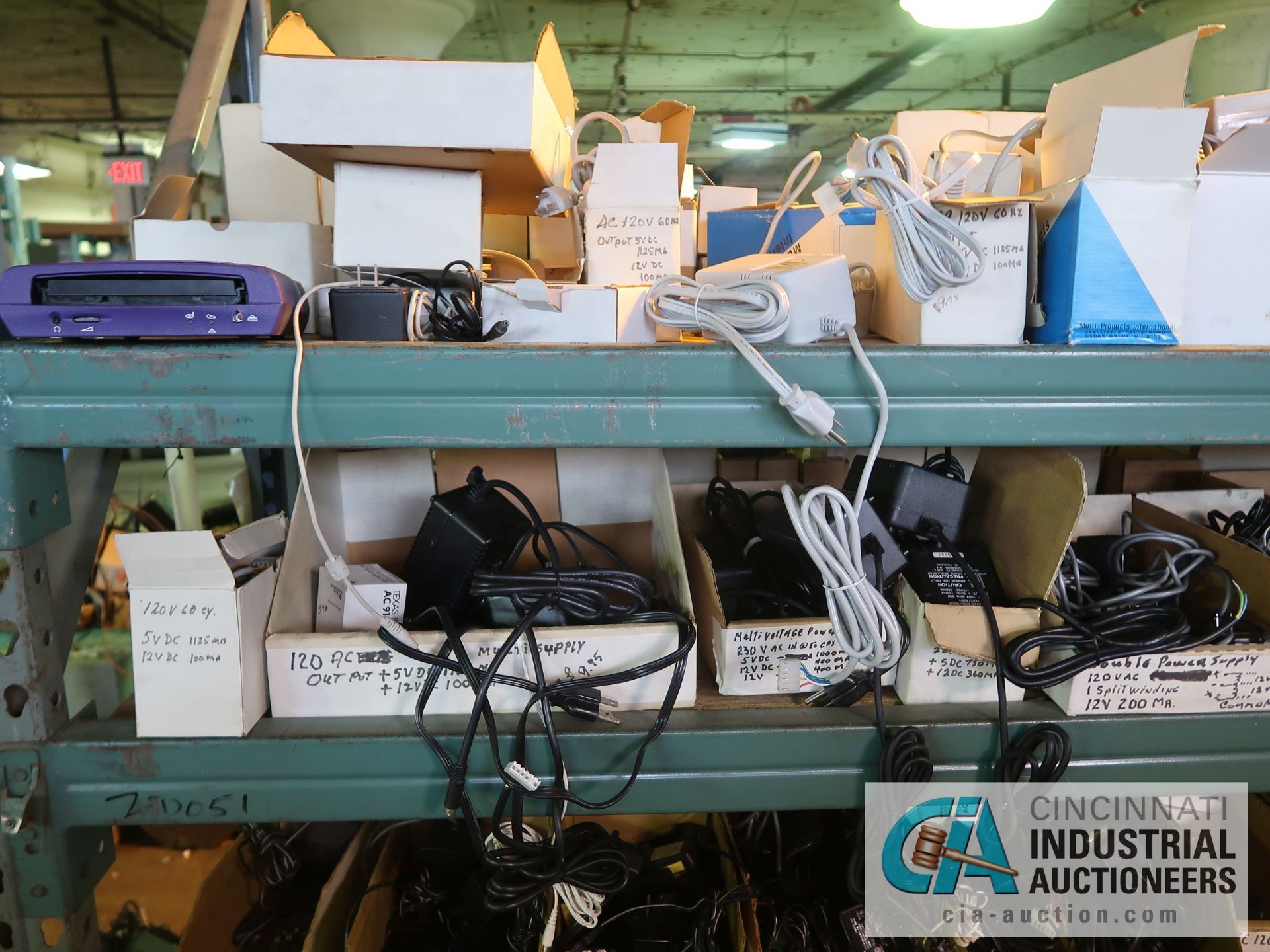 CONTENTS OF (5) RACKS INCLUDING MISCELLANEOUS POWER CORDS, BATTERY CHARGERS **NO RACKS** - Image 11 of 21