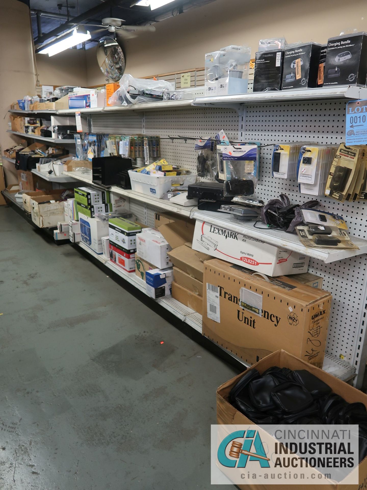 (LOT) CONTENTS OF DISPLAY RACKS INCLUDING TONERS, CELL PHONE HOLDERS AND CASES, PRINTER CABLES,